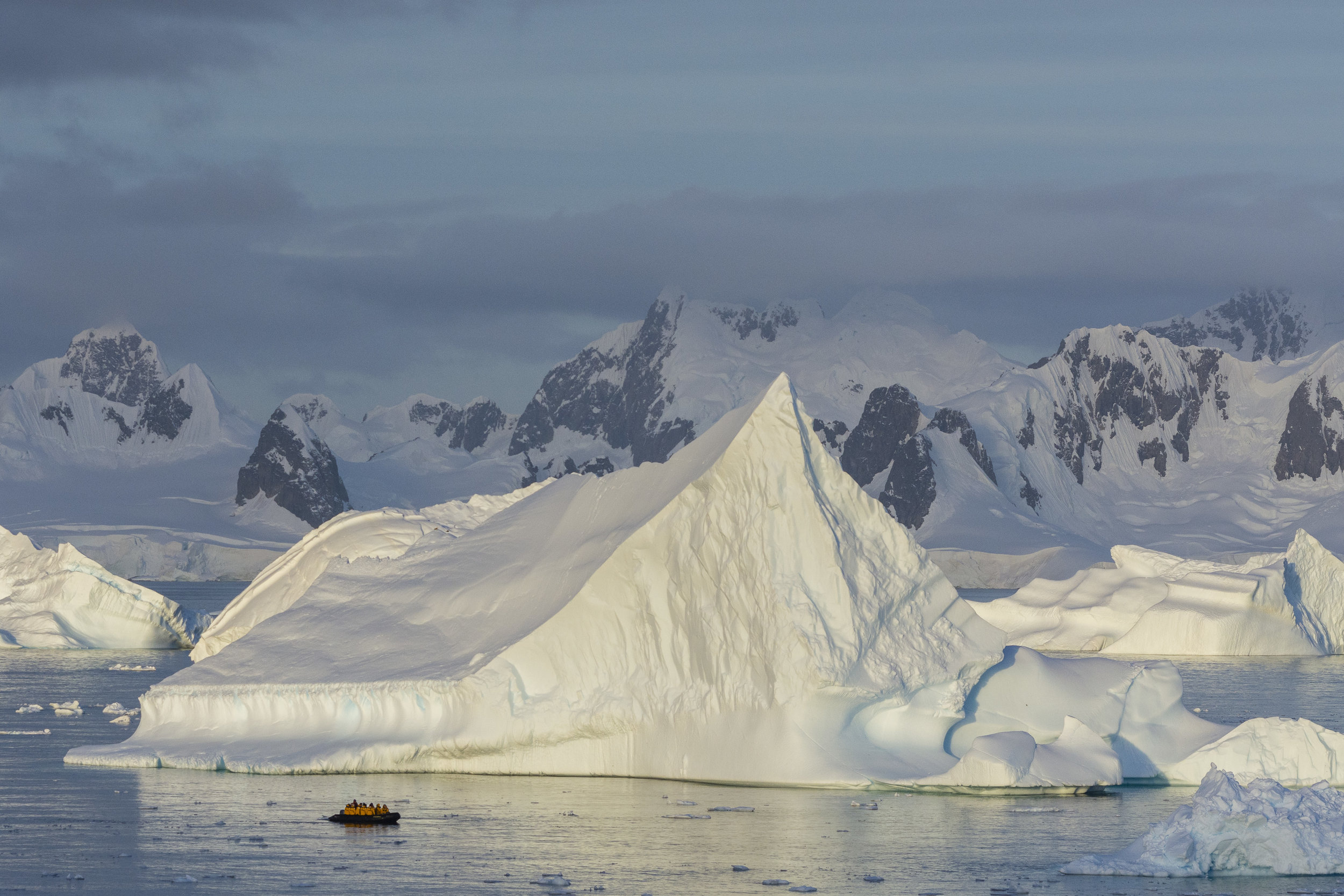 Zodiac and icebergs, Reclus Peninsula, Antarctica