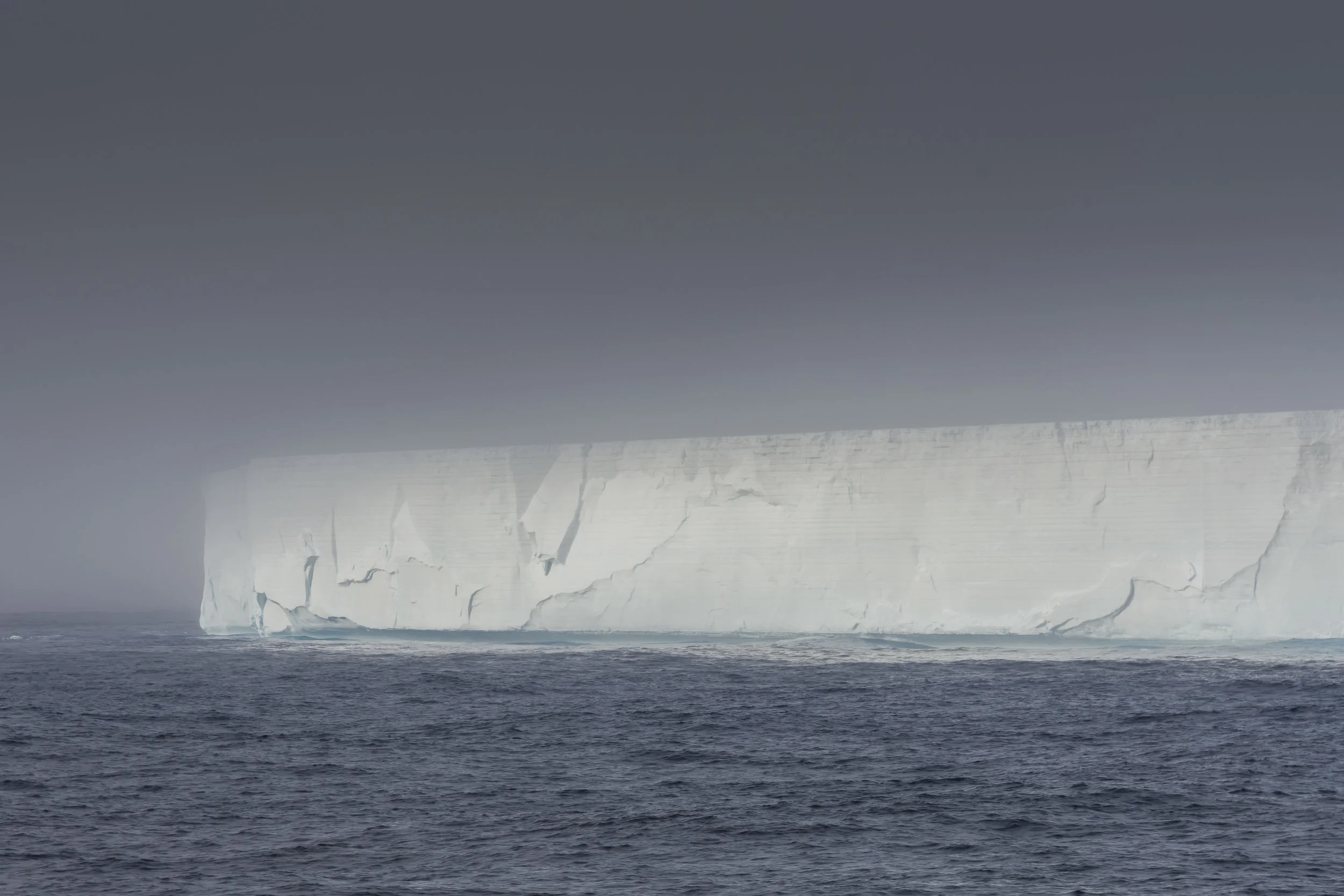 Giant tabular Iceberg B09F in the mist, Weddell Sea, Antarctica
