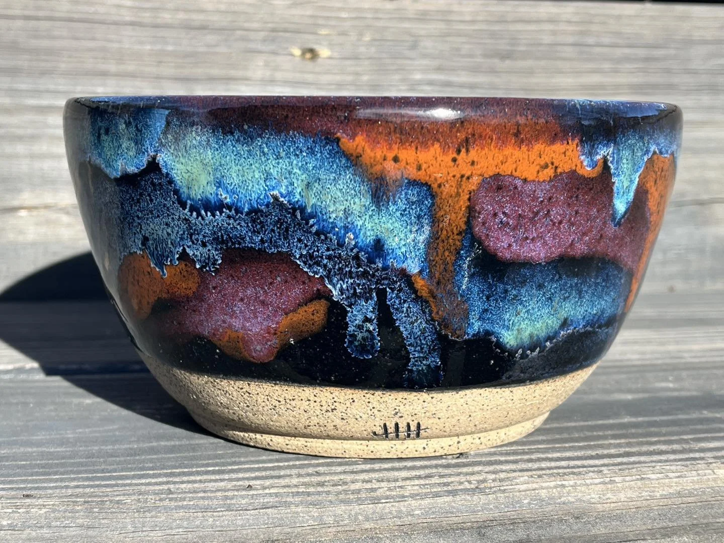 Ceramic bowl with bright colored glazing.