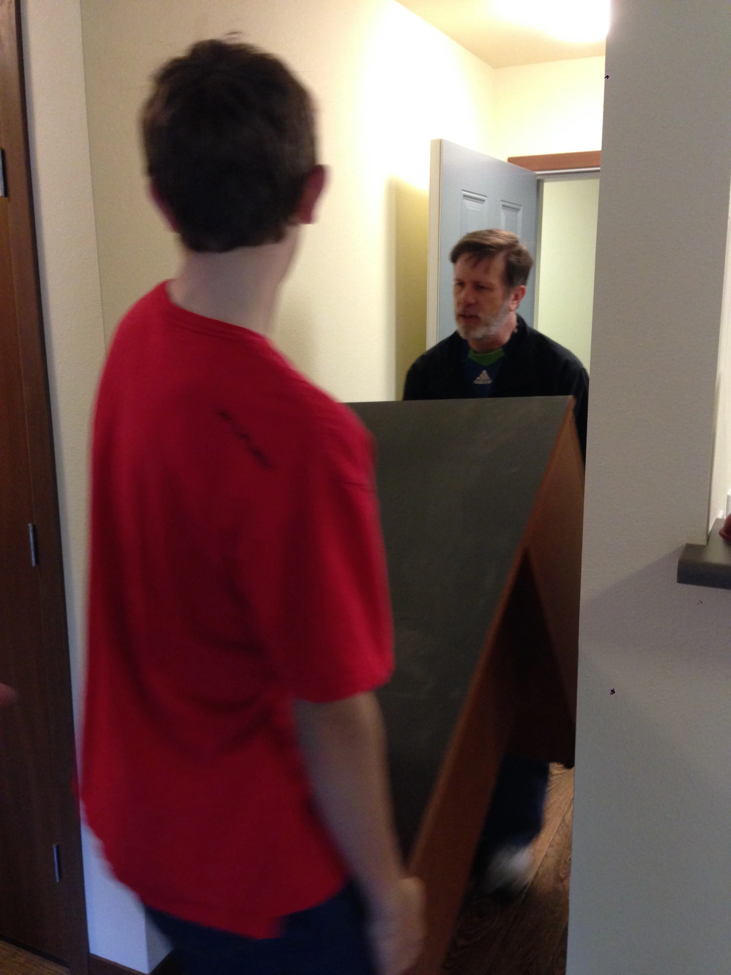 Chris and Steve helping bring in a HUGE desk. 