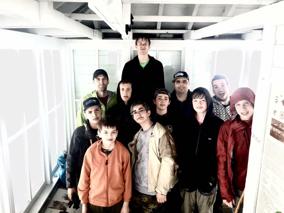 Chris is tall, but he is also standing on a bench