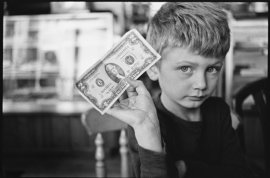 Roger couldn't resist Jasper hustling him for a $2 bill out of his wallet "cuz it's my birthday".