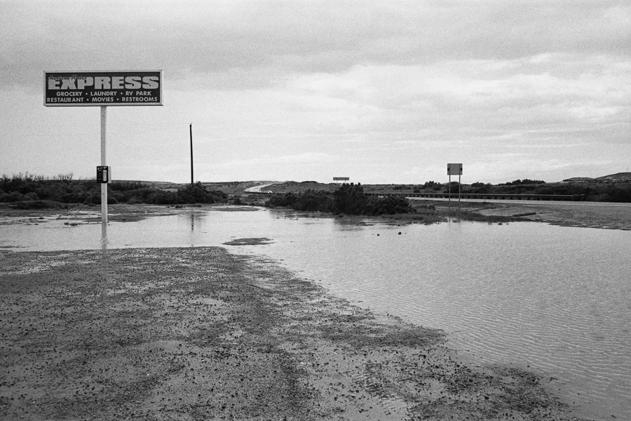 ^ Following our rain rushed camp pack-up we had planned to go to Mesa Verde National Park since the kids were learning about Native Americans. However, the drive there was a constant biblical-holycrapwhydon'ttheswindshieldwipersgofaster-torrential-downright ridiculous rain...like more than I've ever seen in my life...like, well, time to build an ark ridiculous. So we decided to skip Mesa Verde and head back to sunny Lake Powell.