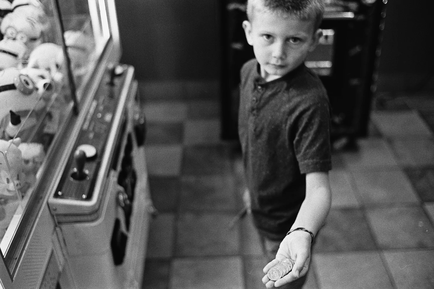 ^ Jasper is a master of finding change. Every place we go he is on all fours digging around under counters and displays looking for change. He also learned this trick that if you put a knife in the coin slot of a video game machine you can jiggle loose any stuck change. Here he demonstrates the technique in a truck stop. This particular machine netted him $3! 