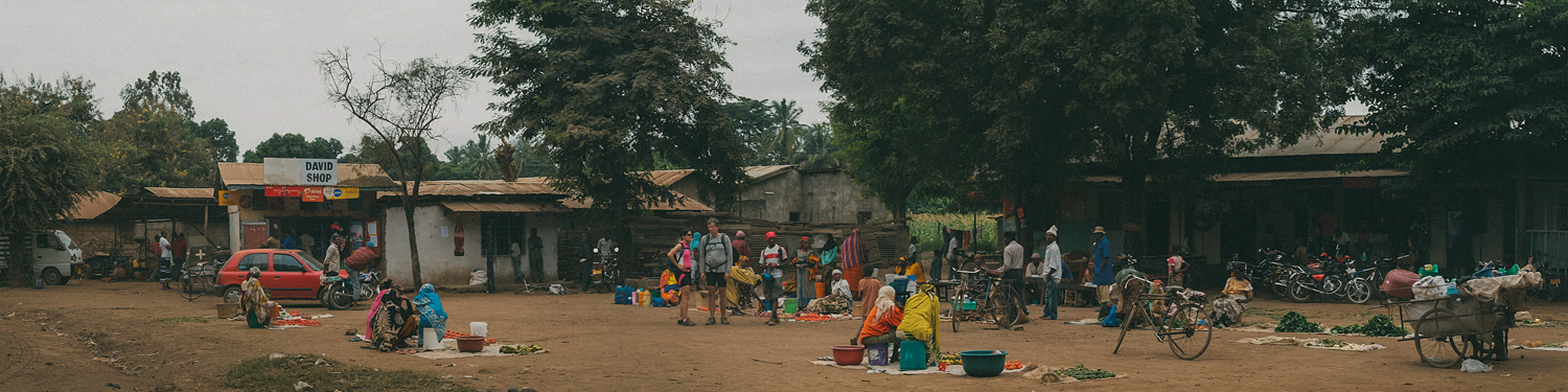 ^ Stopping by a local street market.