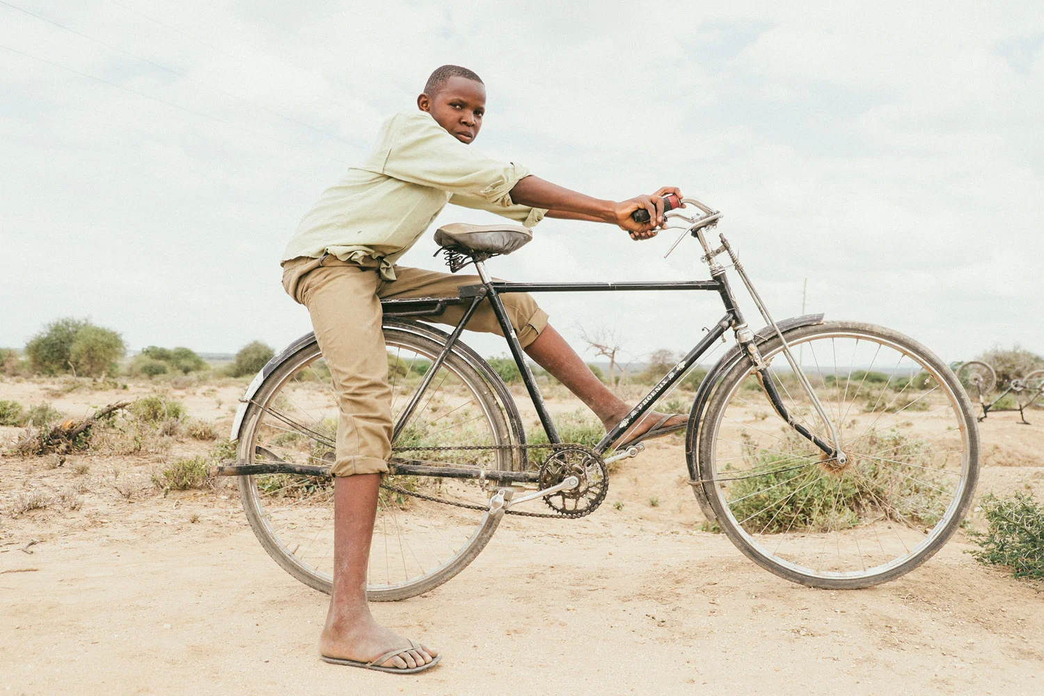^ This is Alvin. Alvin rides a bike that by all accounts shouldn't work in rural Tanzania, with it's lack of gears, thin road tires, no suspension, etc. To our group's surprise, Alvin blew past our group on the road, then would stop and wait for us, then blow past us again. 