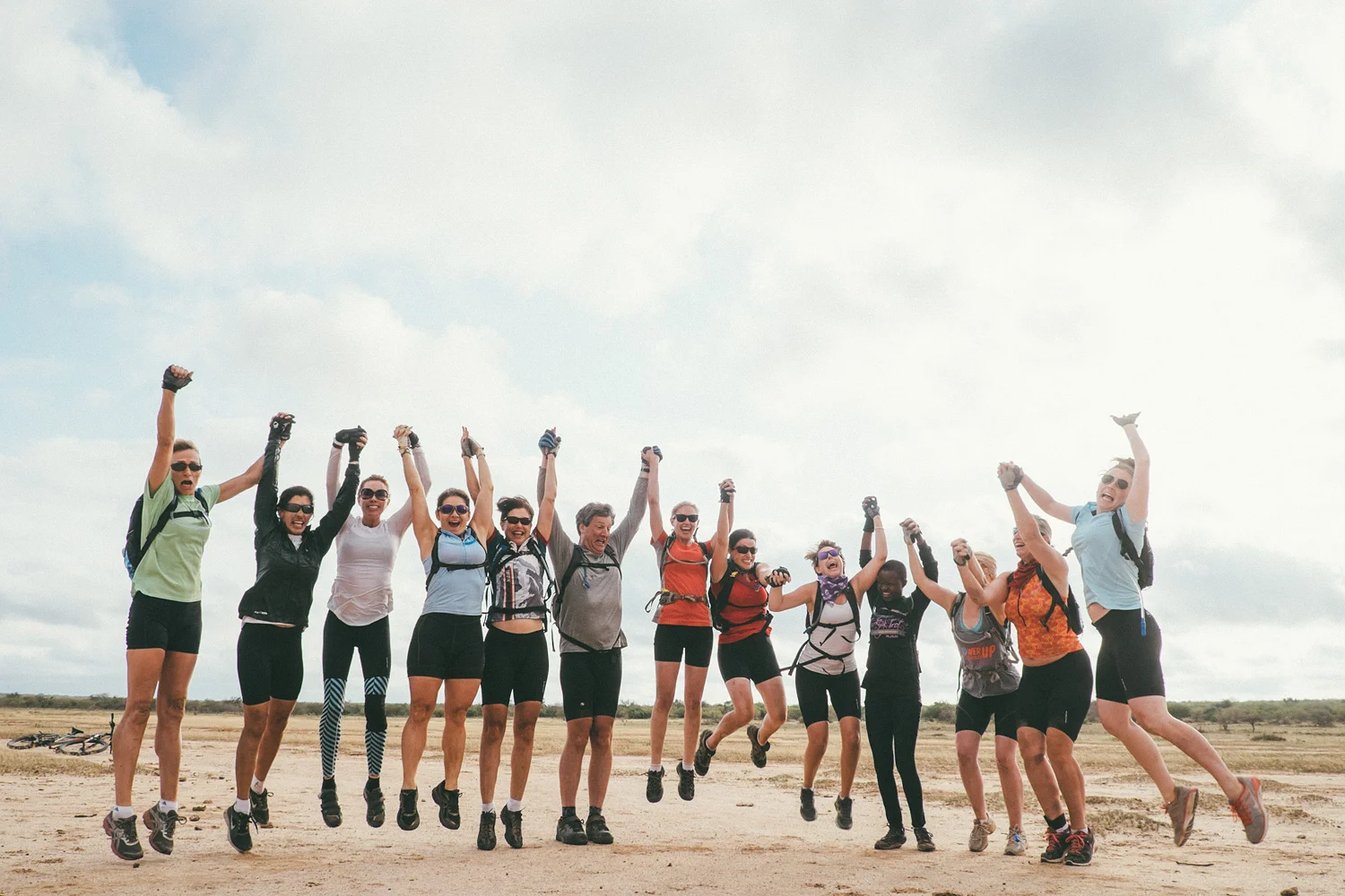 ^ A well rested early morning crew, ready for our daily yoga break. One of our riders, Katia is a yoga instructor so every day after 30-60 minutes of riding in the morning we'd all break, lay out a big tarp wherever we'd happen to be and yoga it up.