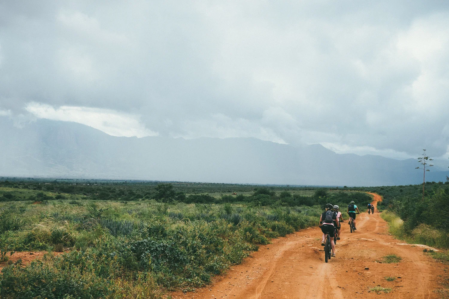 ^ The rains finally subsided and I was reunited with my cameras just in time to glimpse to first clear view of the Usambara mountains. Little did I realize that by the end of that day after riding and hiking for seemingly endless hours we would be standing on top of those very mountains.
