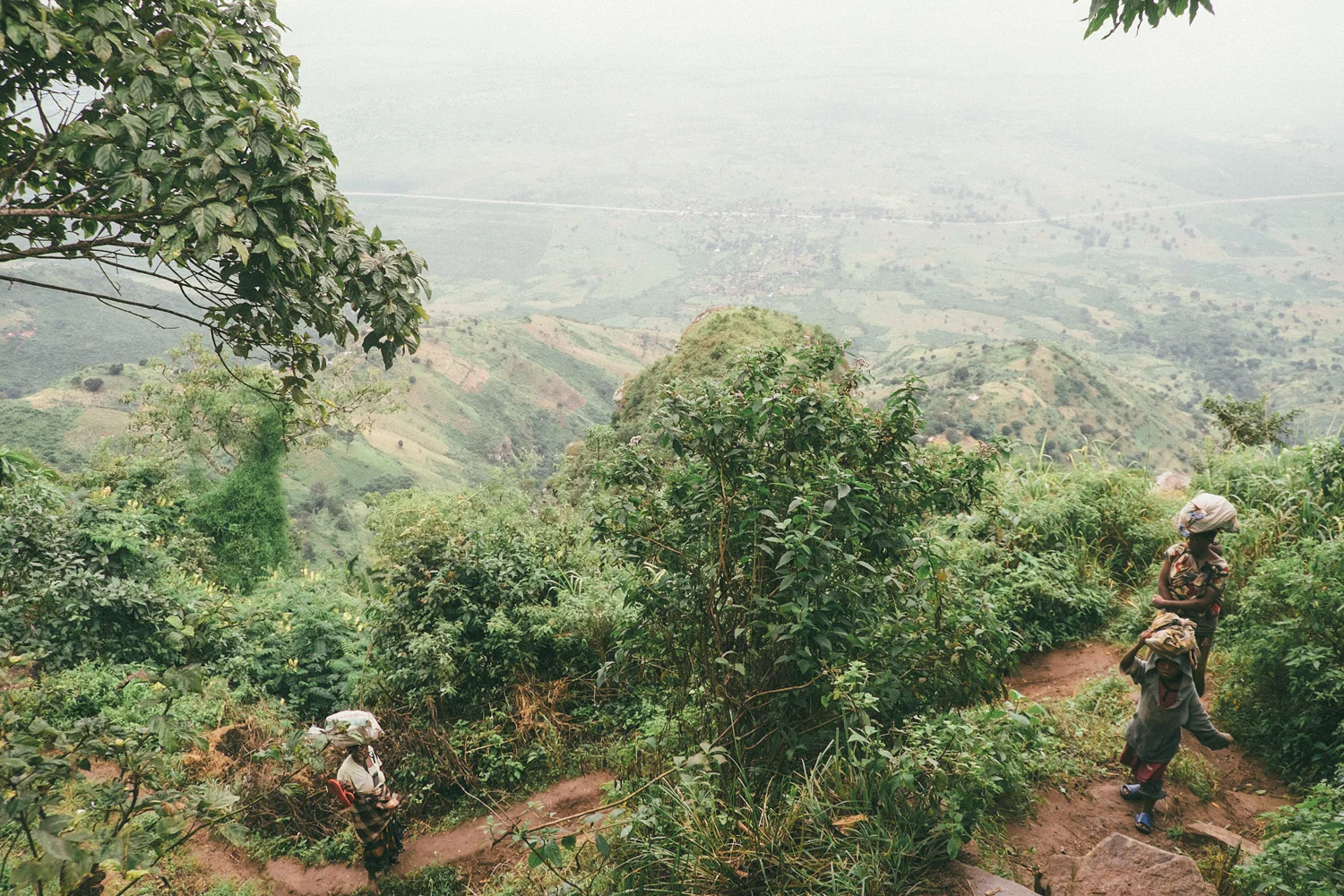 ^ I've done some pretty serious hiking over the course of my life and this climb was no-freaking-joke, a true accomplishment to make it to the top. Of course on our way up some of the sections local women would pass us carrying their child on their back, huge bags of corn balanced on their heads, a machete in one hand, and bare feet. Amazing. 