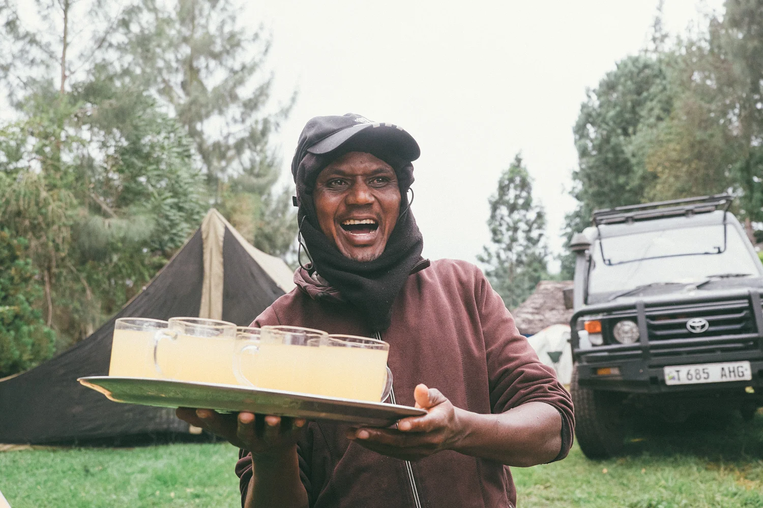 ^ Finally made the summit and arrived to camp welcomed by Simba's beaming smile and lemonade!