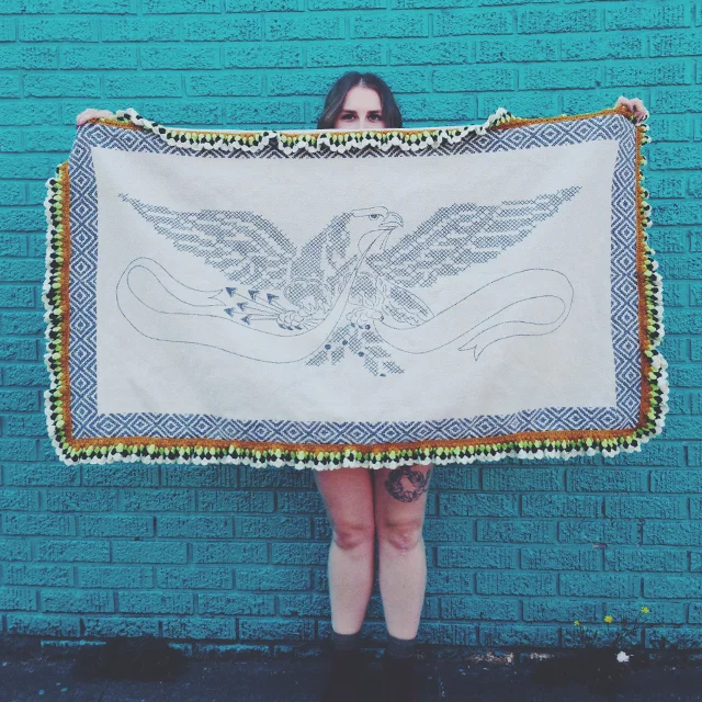Neon pom-pommed eagle rug I snagged at house of vintage.