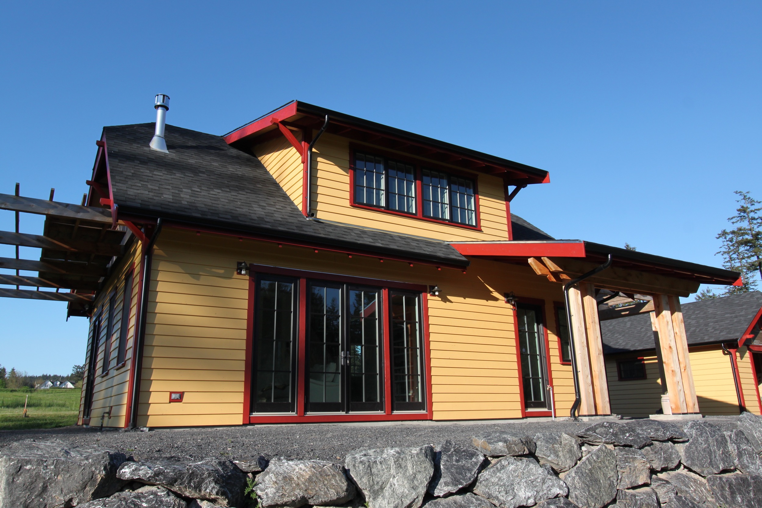 small house with bright cedar siding.jpg