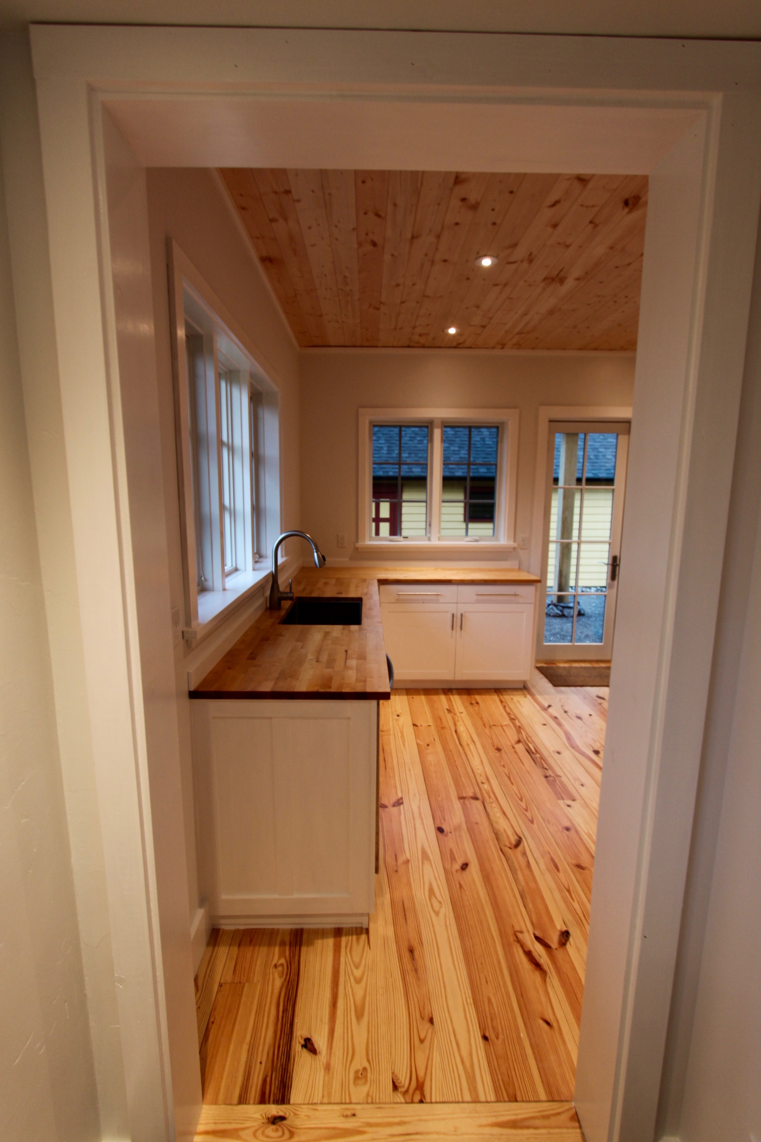 Kitchen sink in beech butcher block countertop.