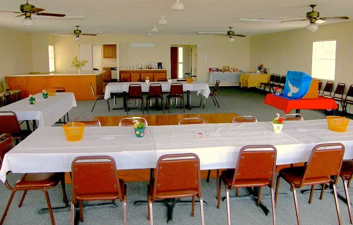 Clubhouse upstairs Meeting / Party room, set up for a meeting. Serving Bar and Kitchen in rear left of photo.