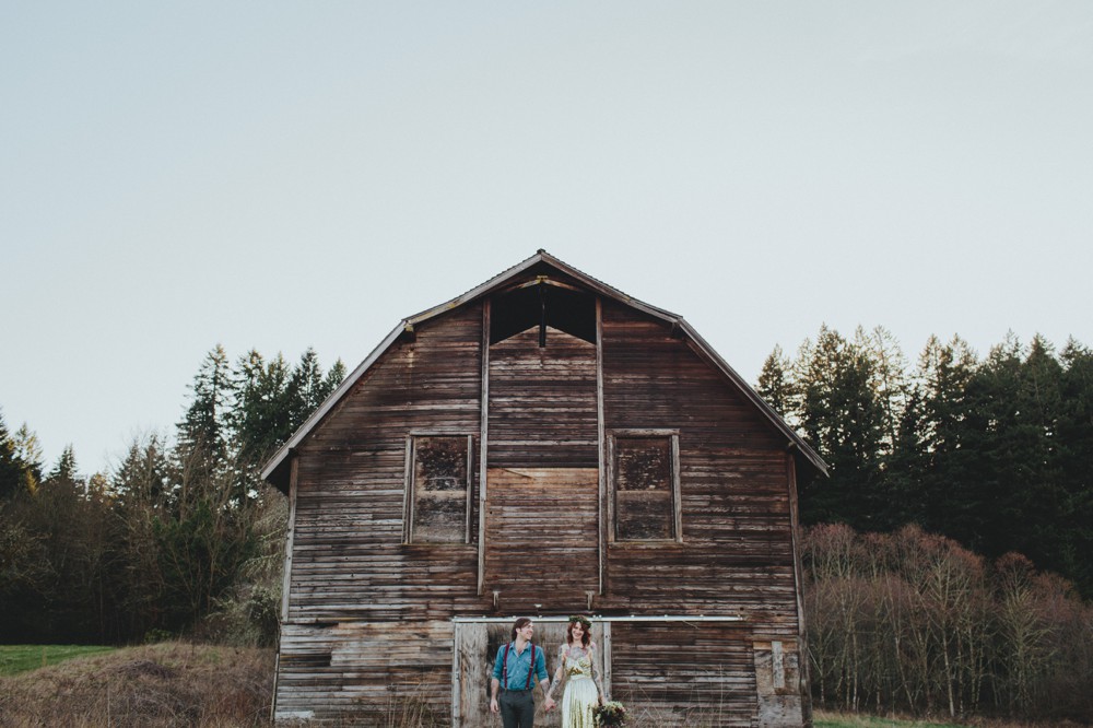 A sweet bride + groom by a barn by Portland wedding photographer Catalina Jean