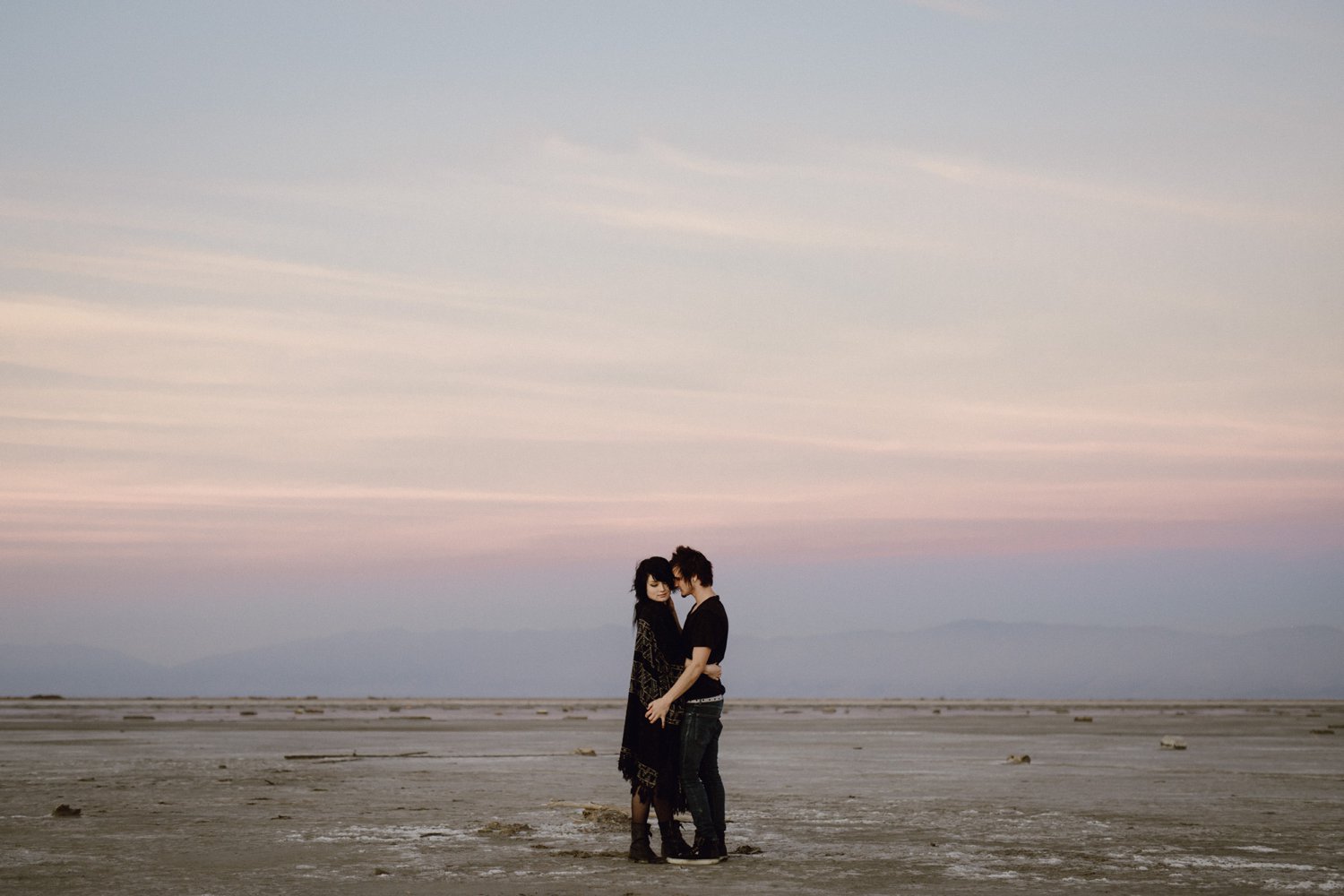 Engagement photo with a colorful sunset