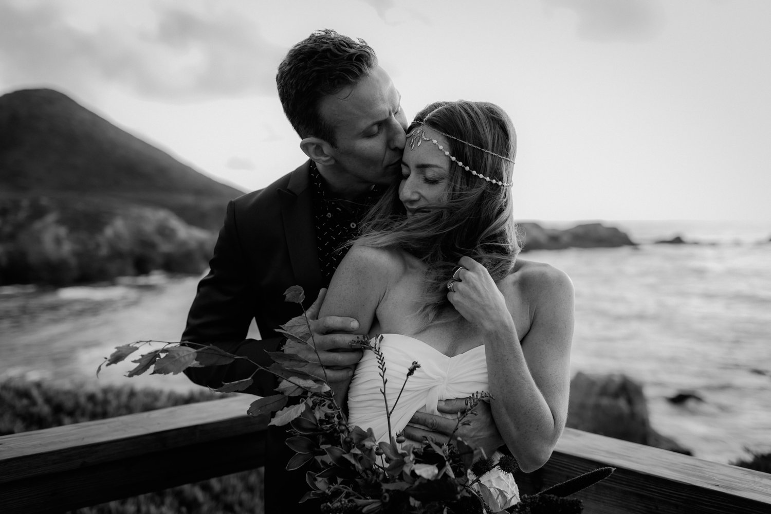 A black and white candid wedding photo by Catalina Jean Photography