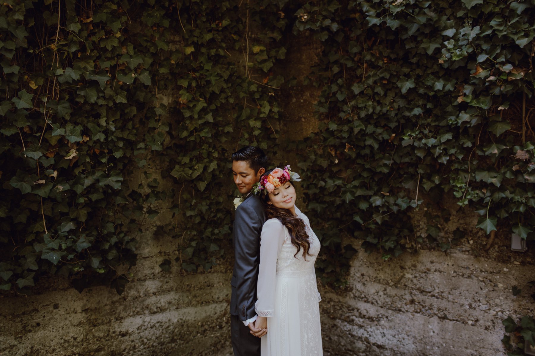 Bride and groom at their Sand Rock Farm wedding with a BHLDN gown and boho details