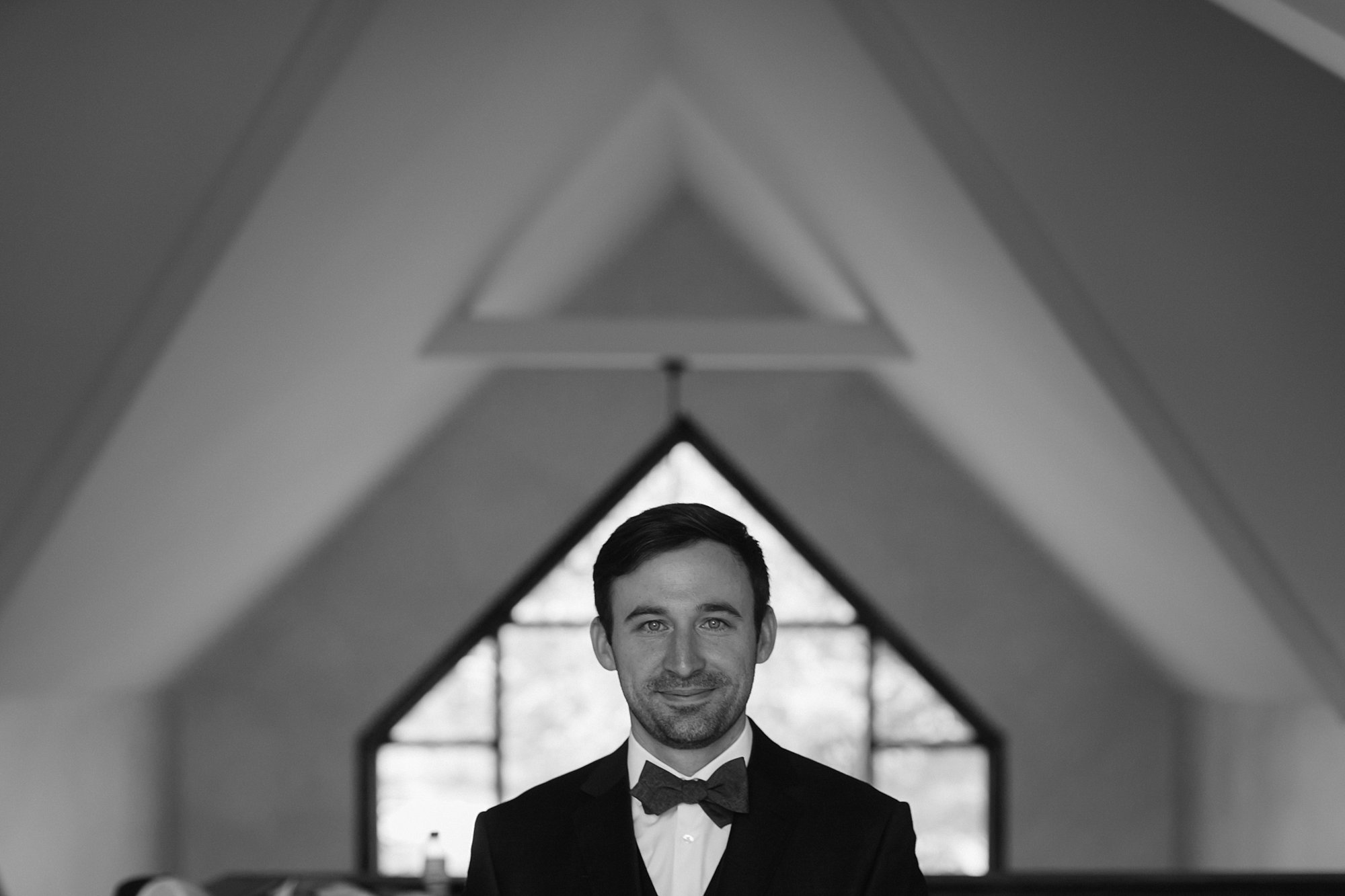 A groom gets ready for his wedding at Ten Mile Station