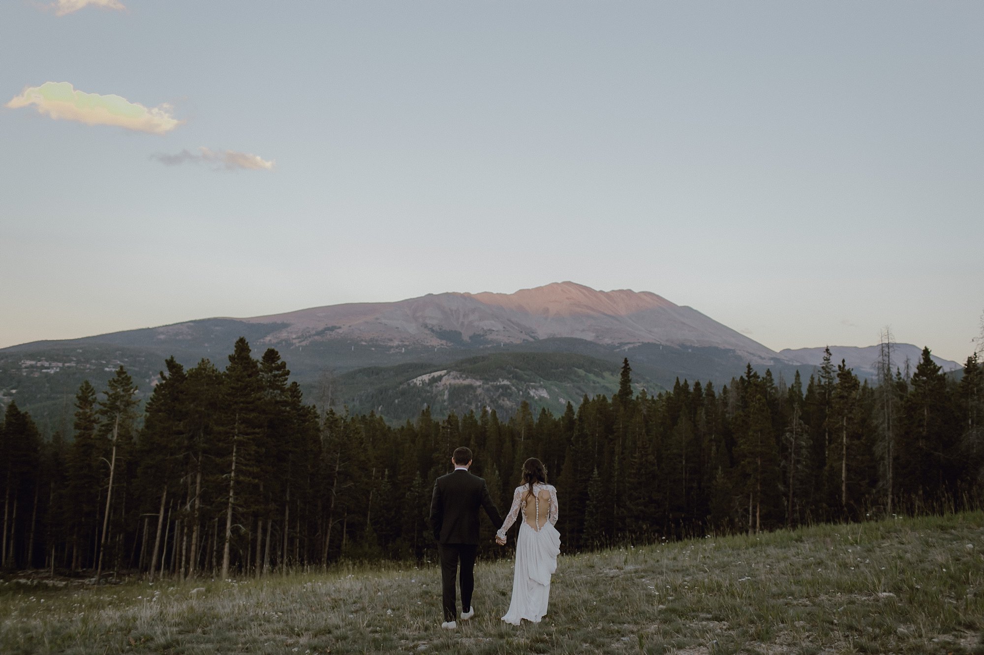 A bride and groom up in the mountains at Breckenridge, CO