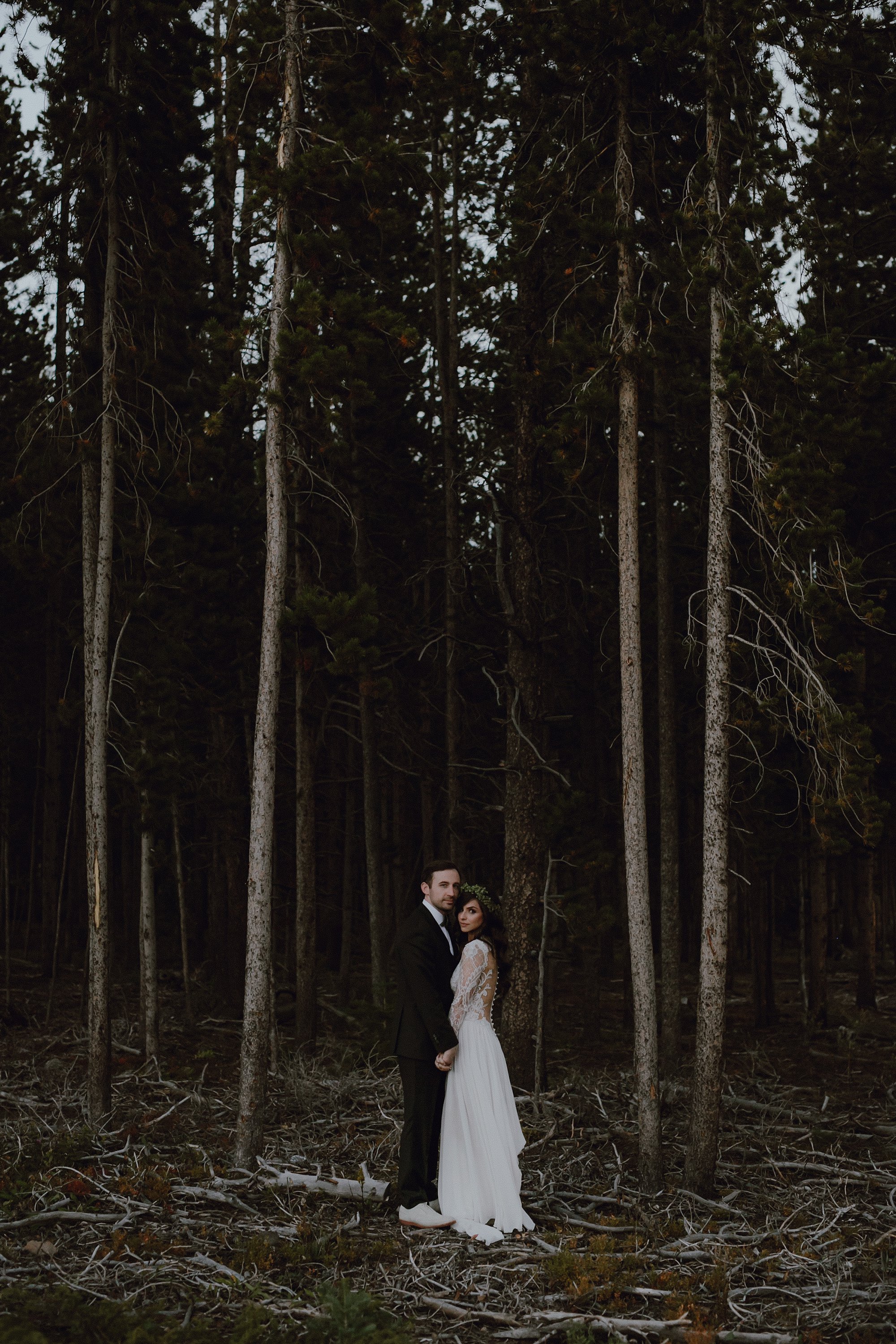 A bride and groom photo in the forest at Ten Mile Station