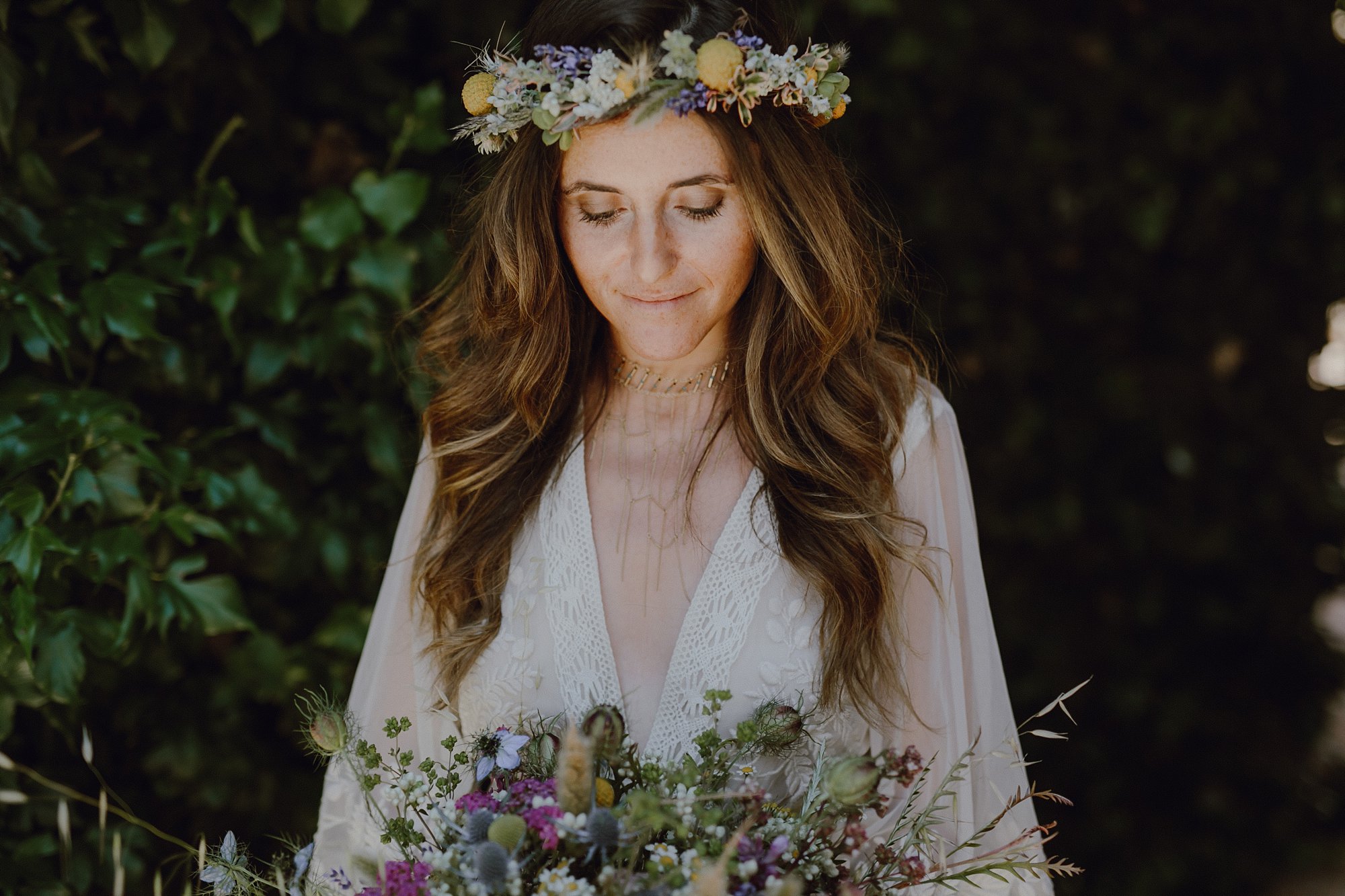 A bride with a flower crown by Kate Healey of Big Sur Flowers