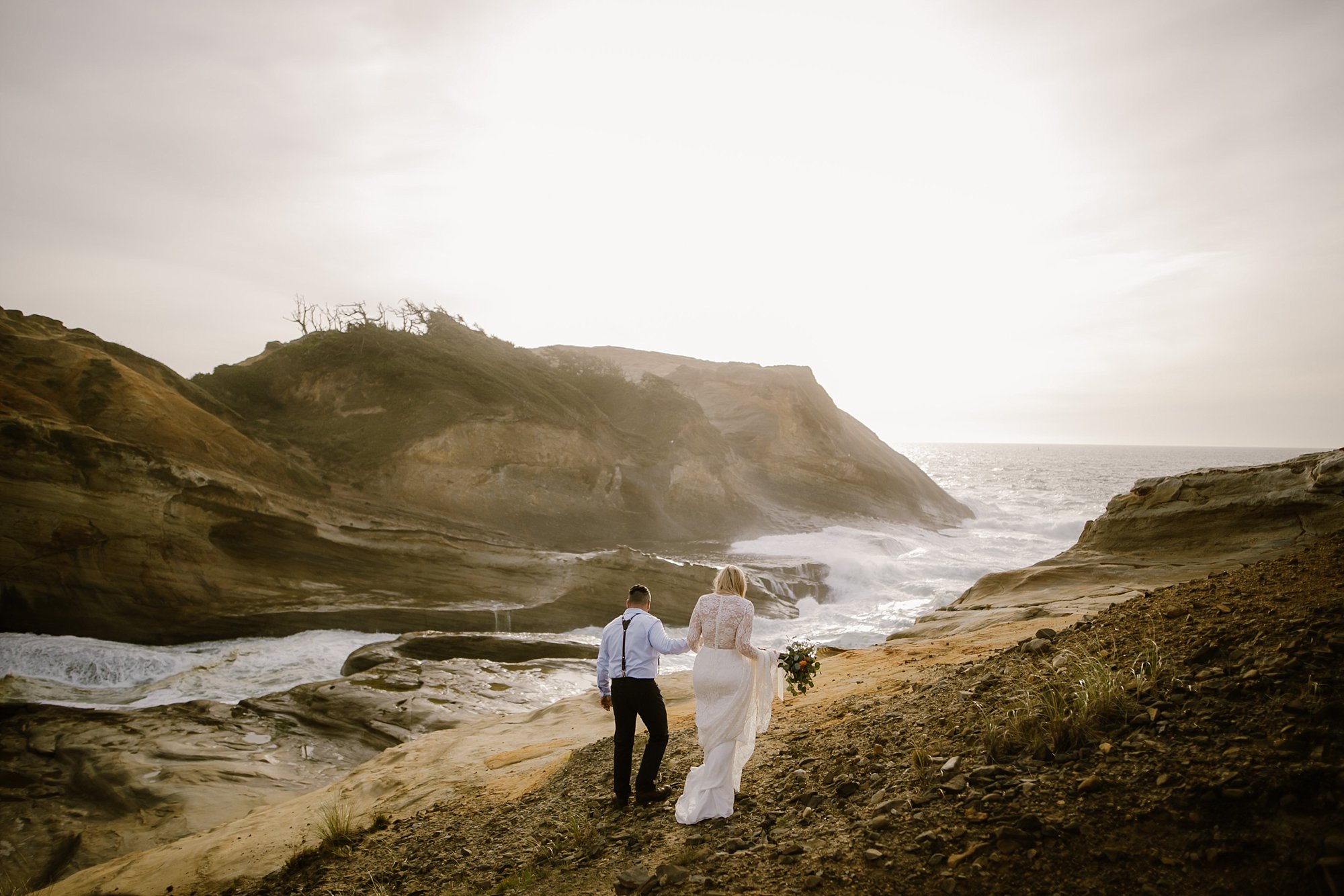 A beach elopement wedding photo at Cape Kiwanda