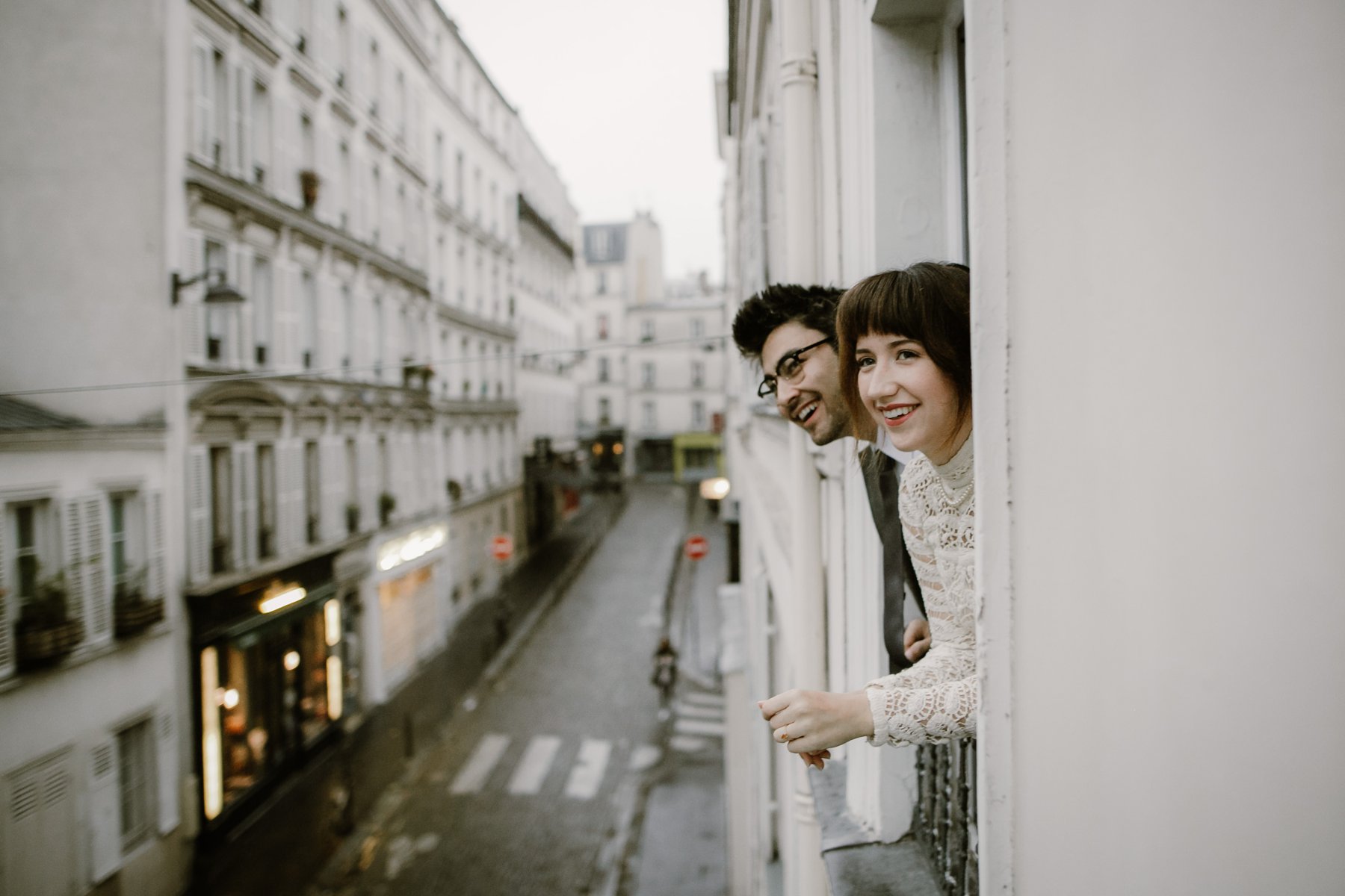 A bride and groom in the streets of Paris before their Parc Monceau wedding