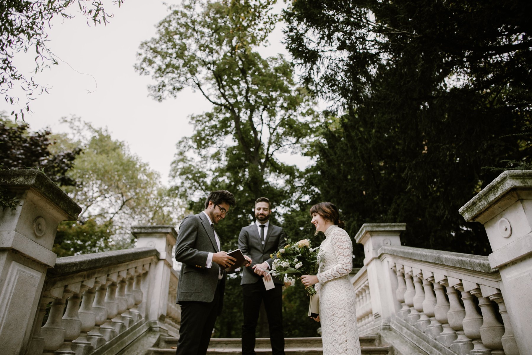 A bride and groom share their vows at their wedding at Parc Monceau