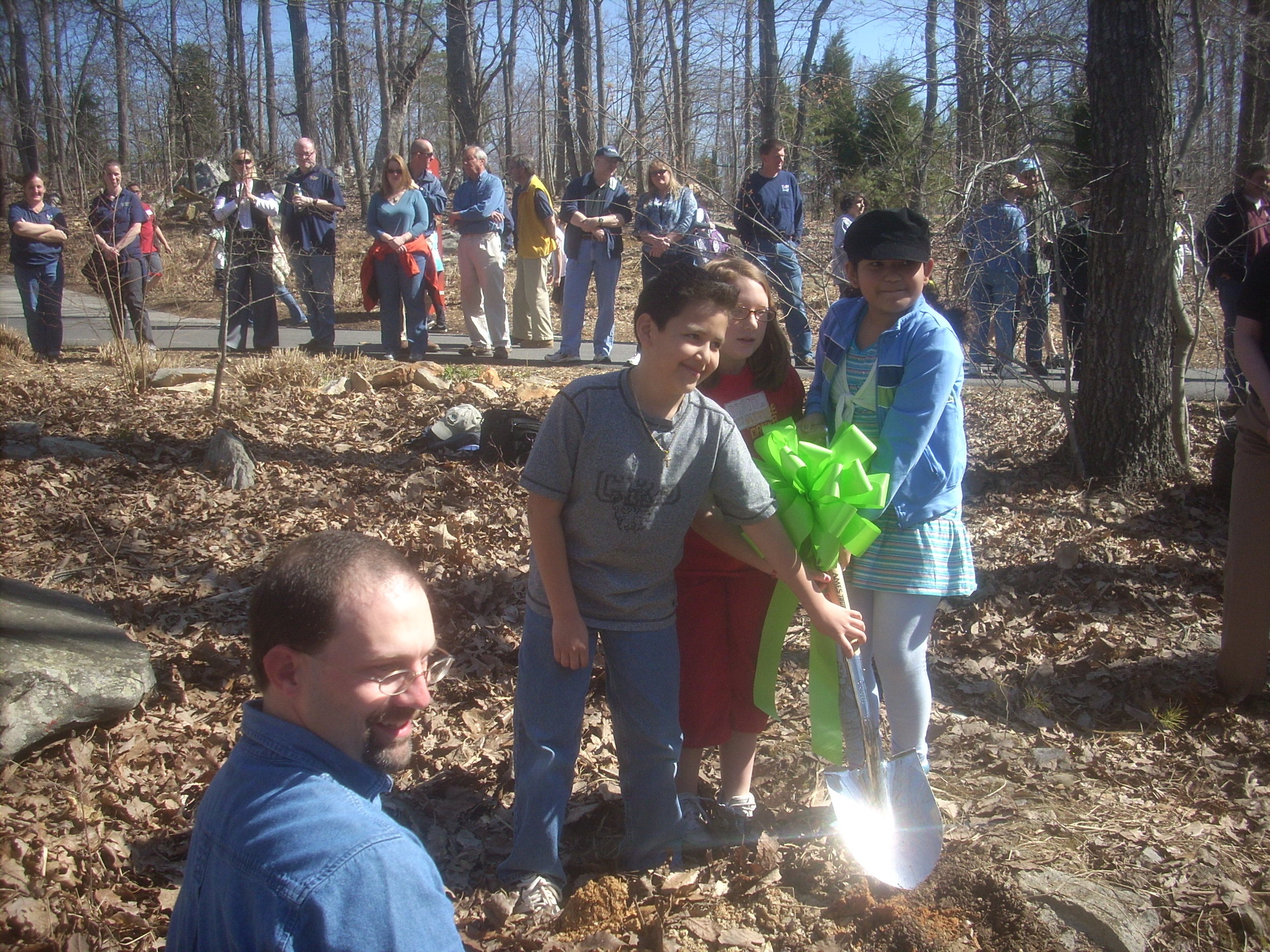 Kids plant chestnut tree.JPG