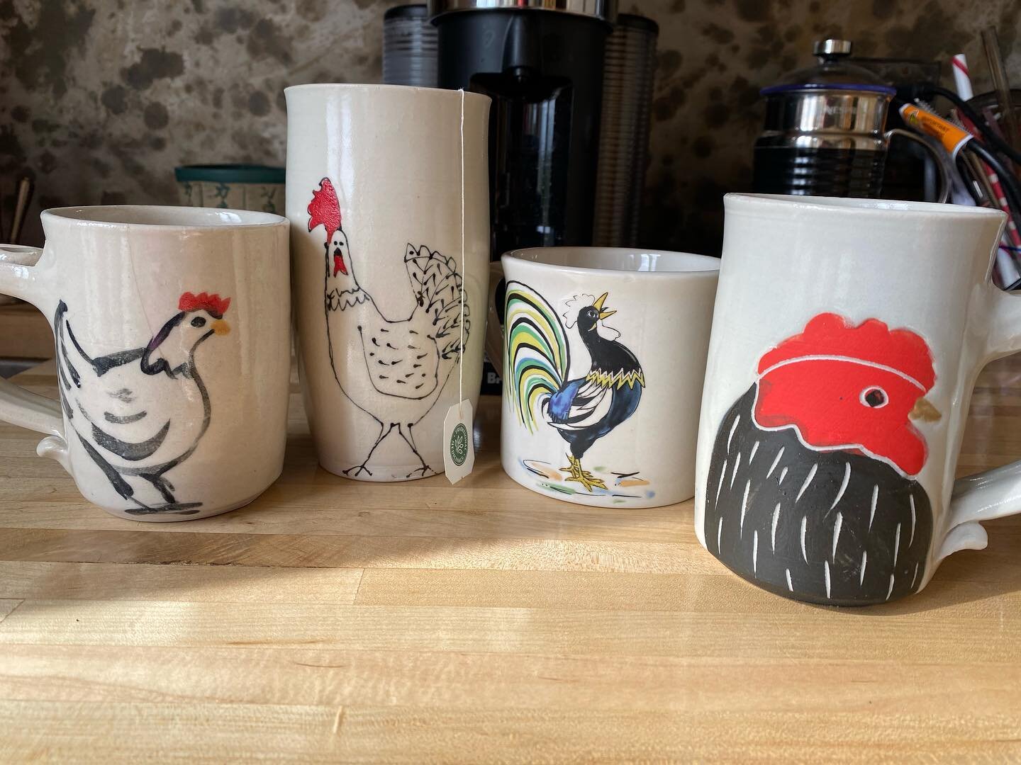 I am obsessed with chicken mugs!  3 of these are from my favorite chicken potter!  Sadly my entire flock of chickens were taken out by the resident coyote.  I think she has a litter to feed so she is getting braver.  She climbed/jumped my 6&rsquo; fe