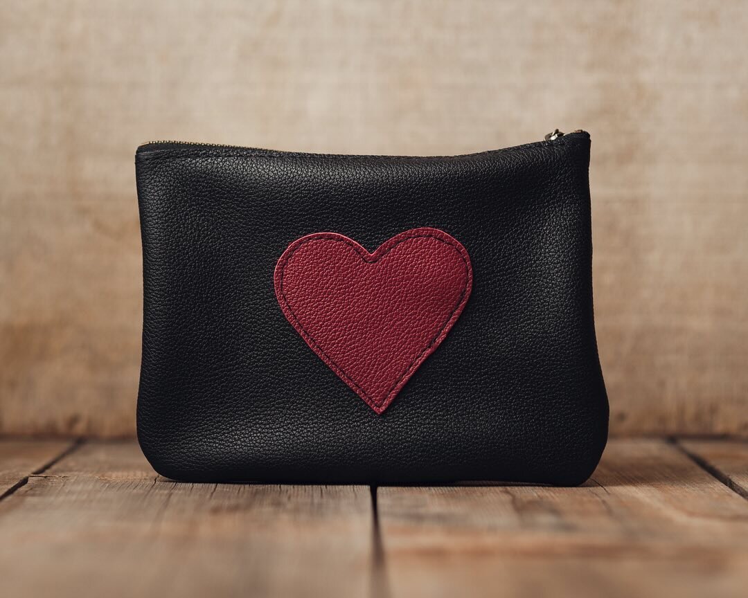 Here at Riverside Studios we&rsquo;re not afraid to wear our hearts on our sleeves. Be free. Express yourself. Leather Heart Wrist Bag by Kahlil @kahlilacc &hearts;️🖤&hearts;️
#redleather #blackleather #heart #leatherheart #leatherwristbag #wristlet