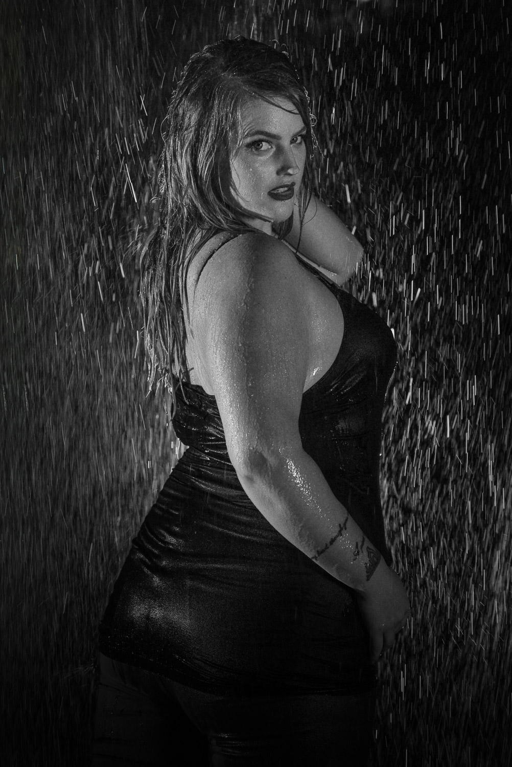 B&W Portrait Photo of woman in the rain, Cowichan Valley to Vancouver