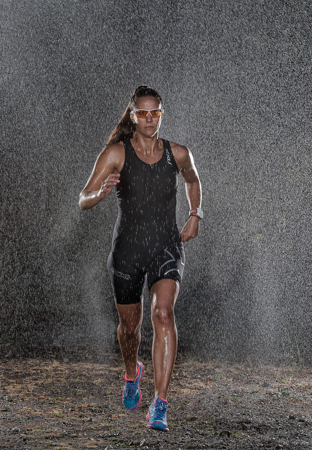 Female National  Team triathlete running in the rain photo, Cowichan Valley to Nanaimo BC