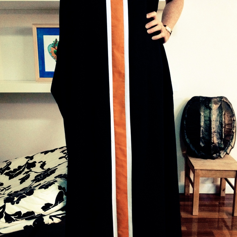 Maxi length, uses a whole lot of fabric but feels goddess like.