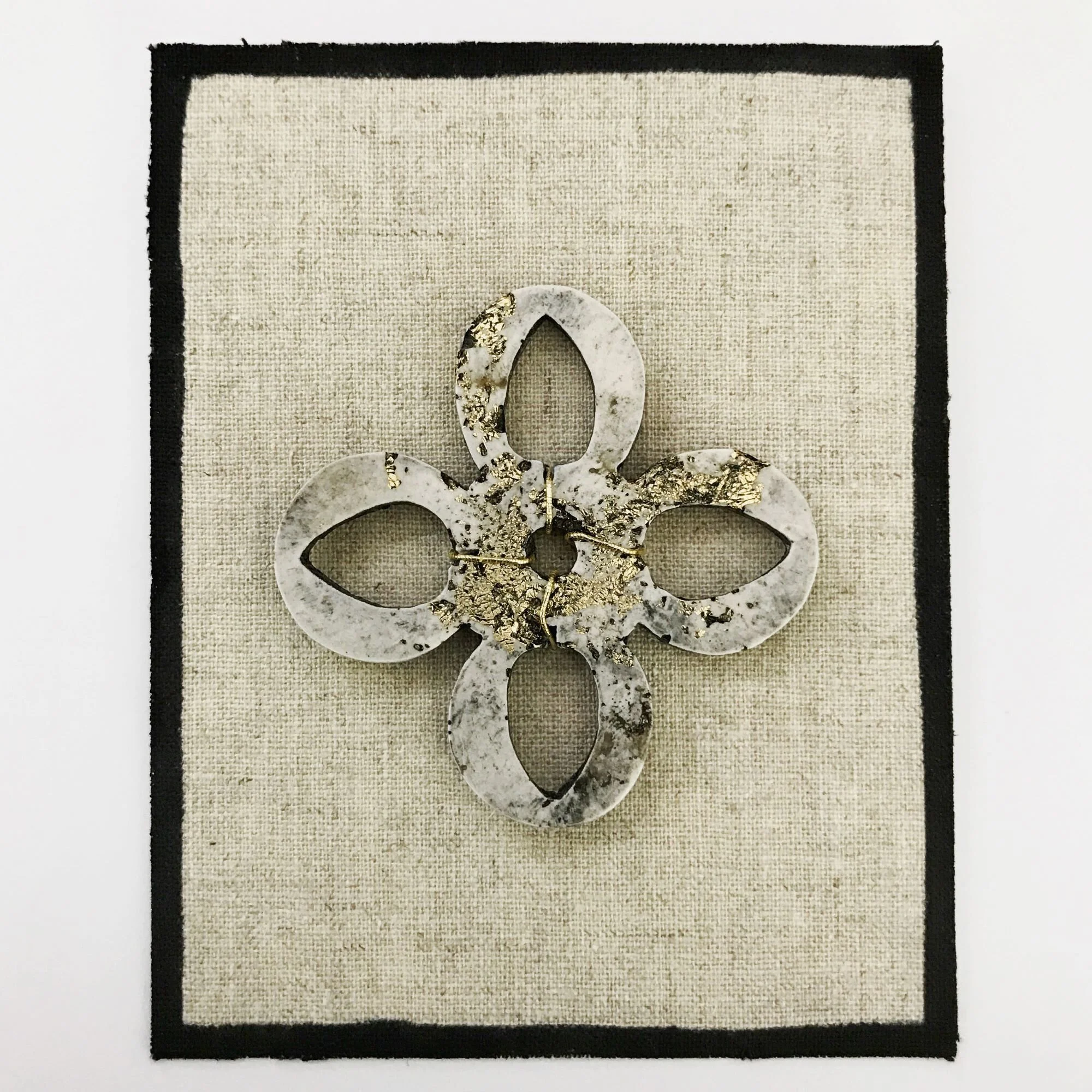 Stone plaster ornament with gold leaf inclusions, wax patina