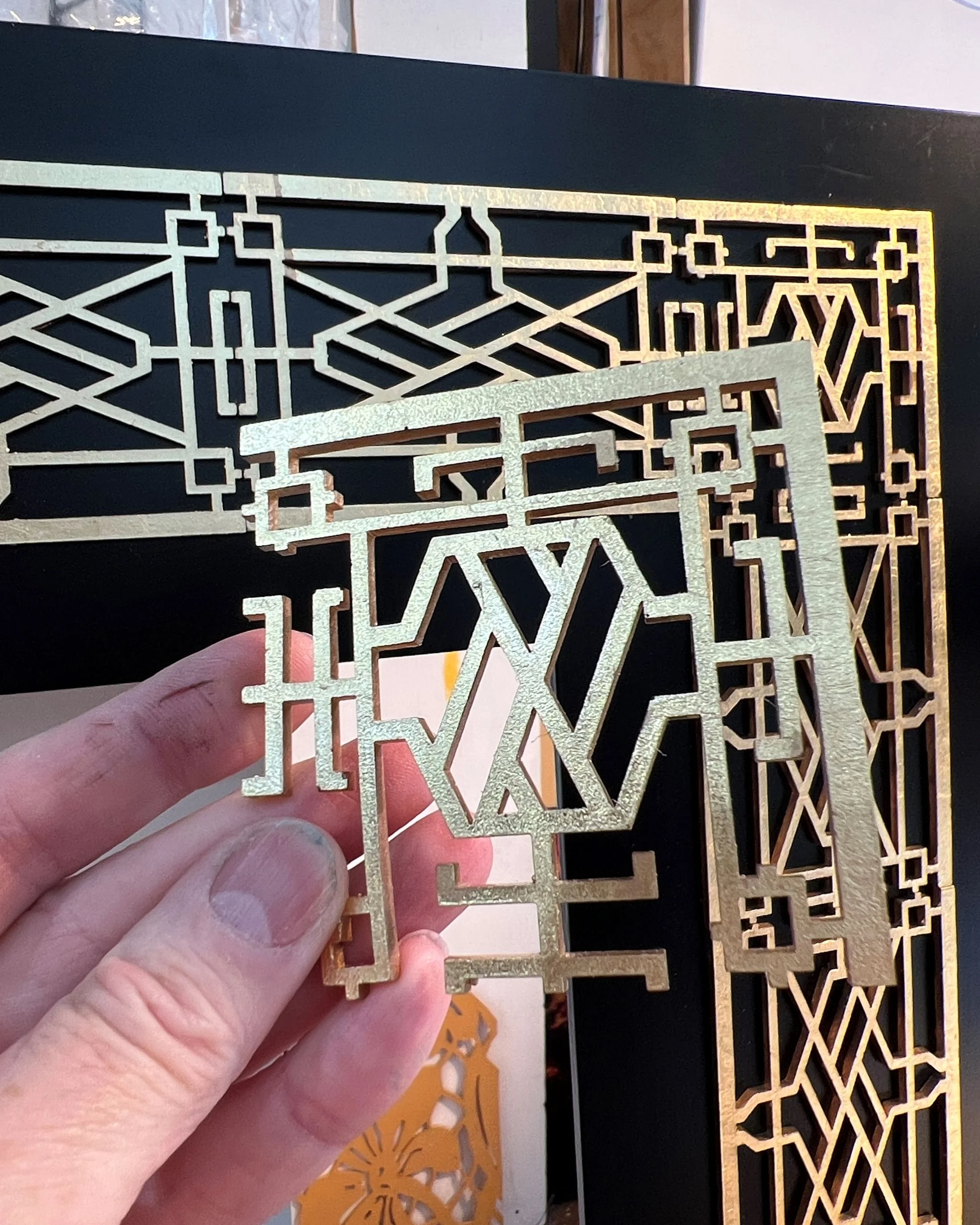 Gilded resin framing detail [studio]