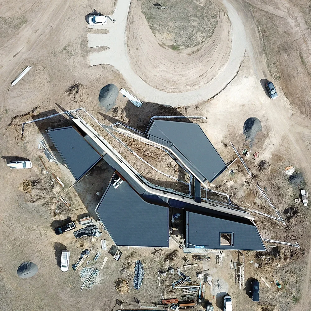 freshwater-rammed-earth-house-aerial.webp