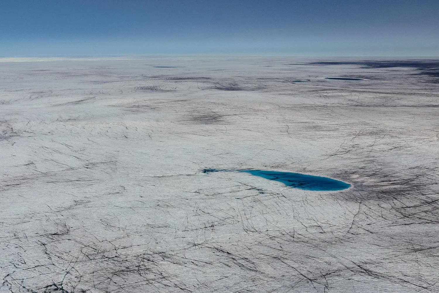 Meltwater Lake and Dark Ice