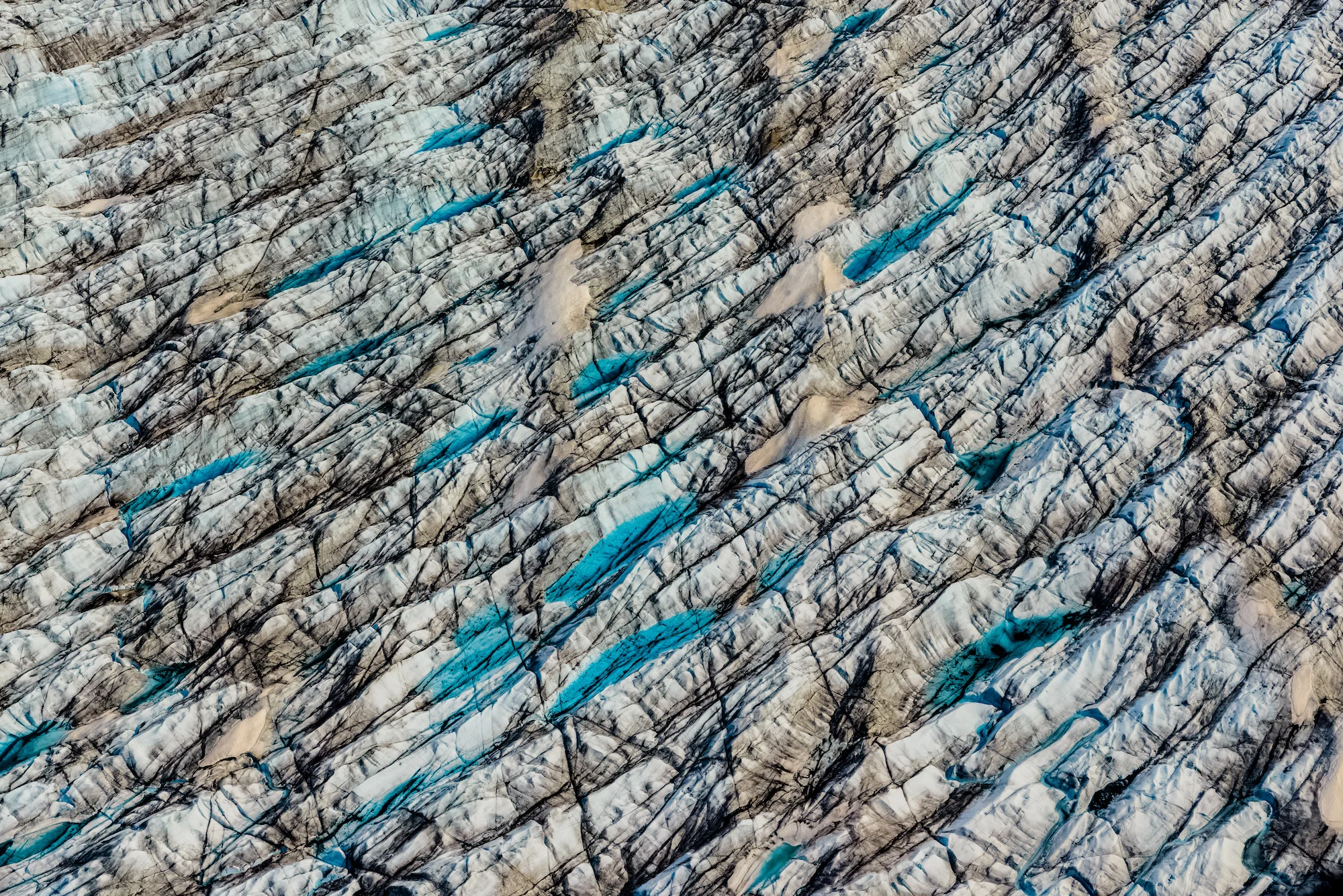 Multi-Colored Crevasses and Supraglacial Lakes