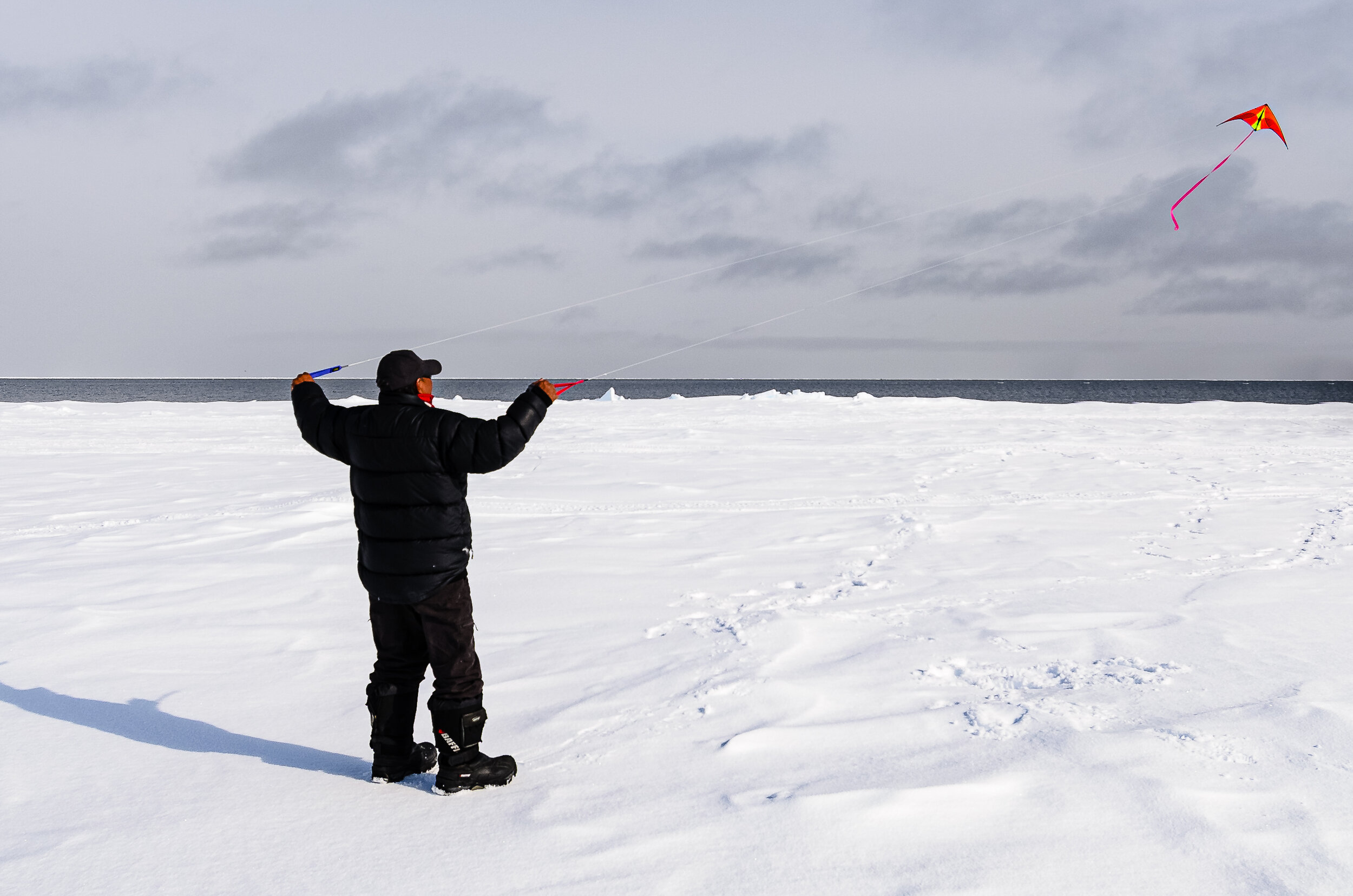 Hunter Flies a Kite at the Floe Edge While Waiting for Narwhal
