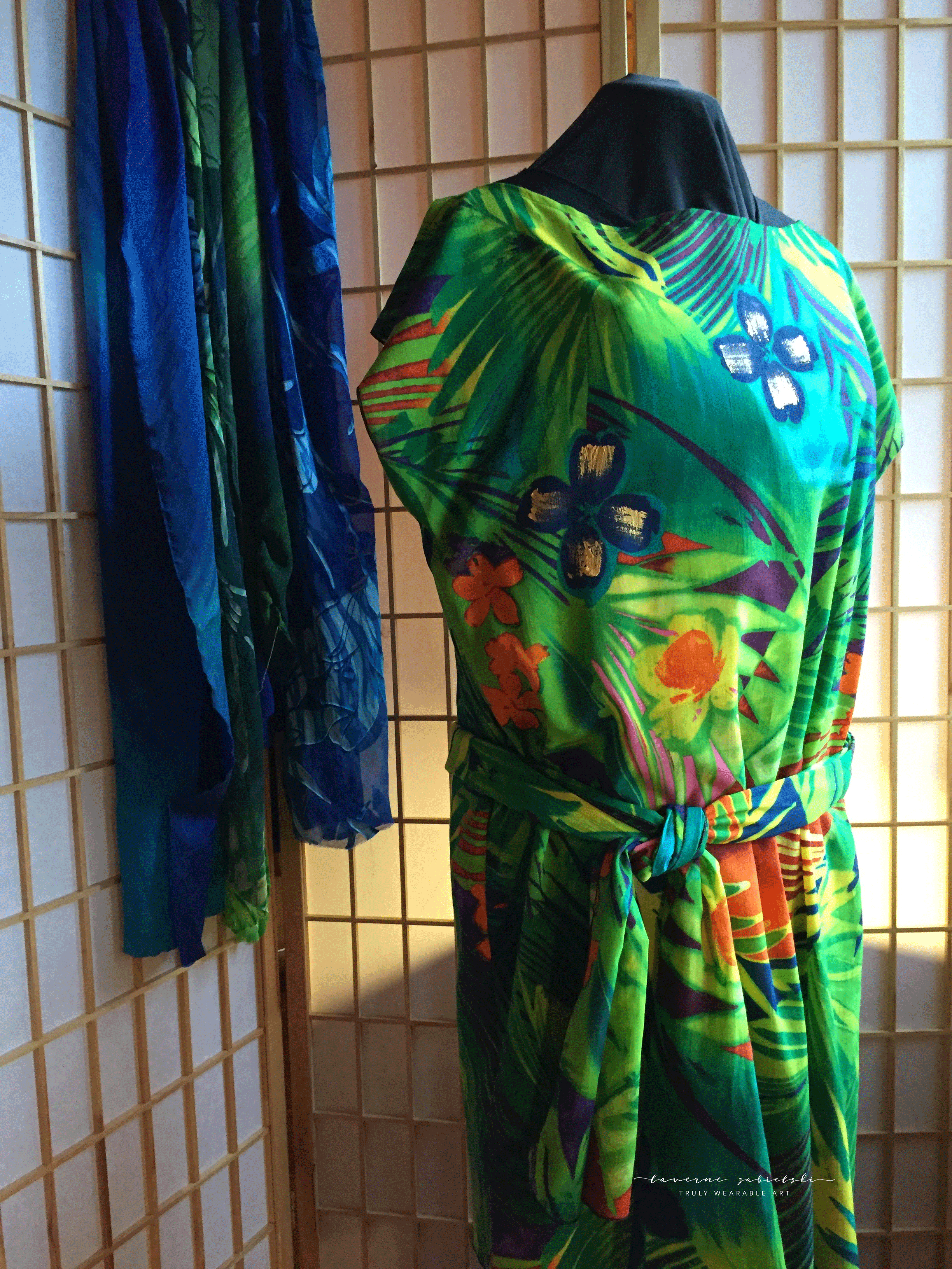 Hand dyed shibori silk, green mixed with blue. Purchased crushed rayon, my boat neck tunic design with painted signature