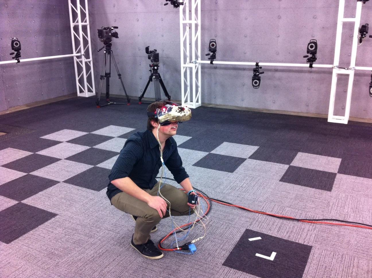 Project Holodeck used motion tracking cameras with the Oculus Rift to try to simulate a Holodeck-like enviroment.