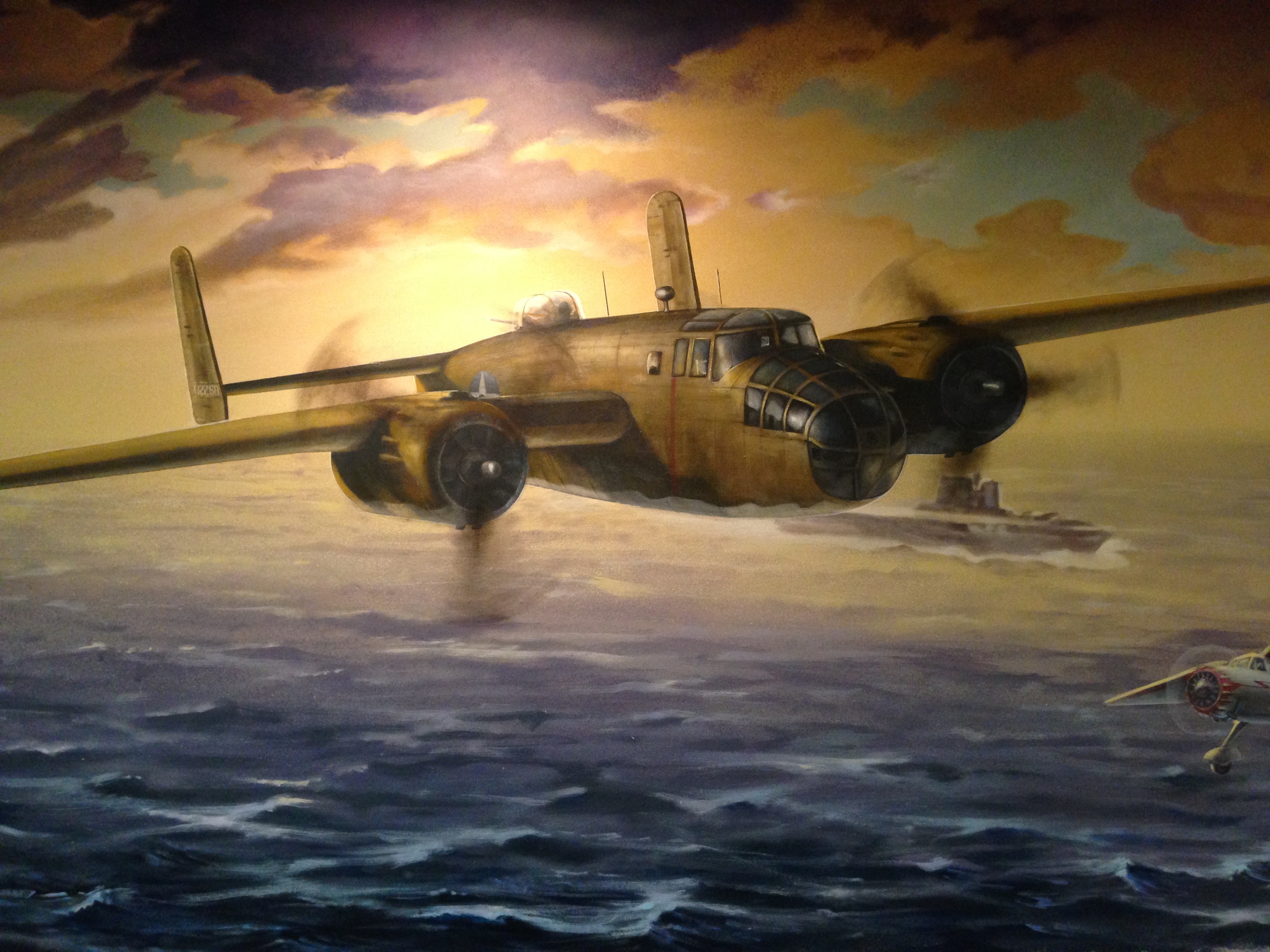 The left side of the mural depicts Doolittle's B-25. In preparation for his famous raid on Tokyo in 1942, the 16 B-25s were flown to Minneapolis for modifications.