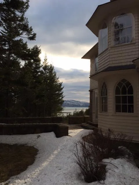 Here is a shot of the house when I visited in April, snow still on the ground, mountains and ocean looking gorgeous in the distance...