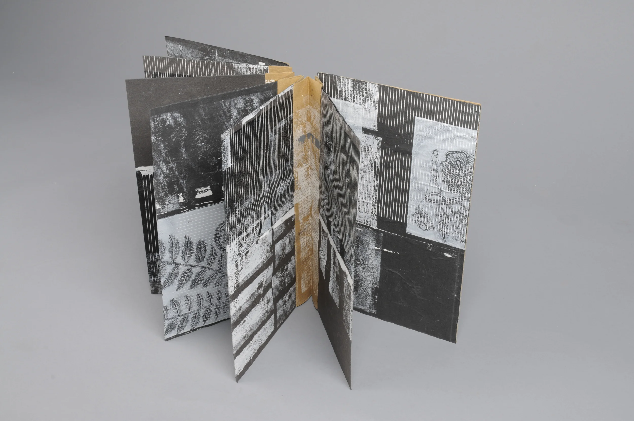 Hand made book with screen and mono print on found paper 2013