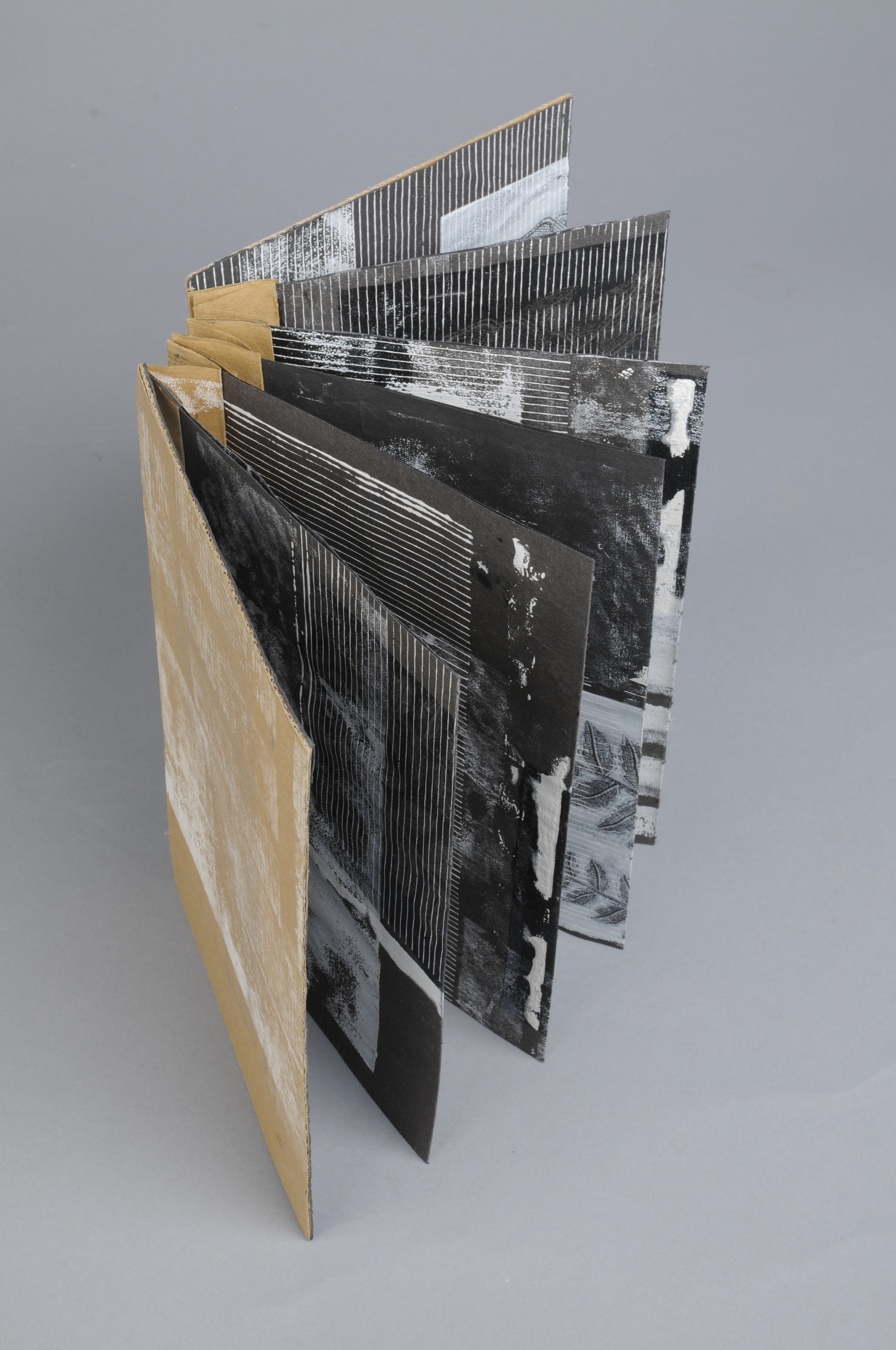 Hand made book with screen and mono print on found paper 2013