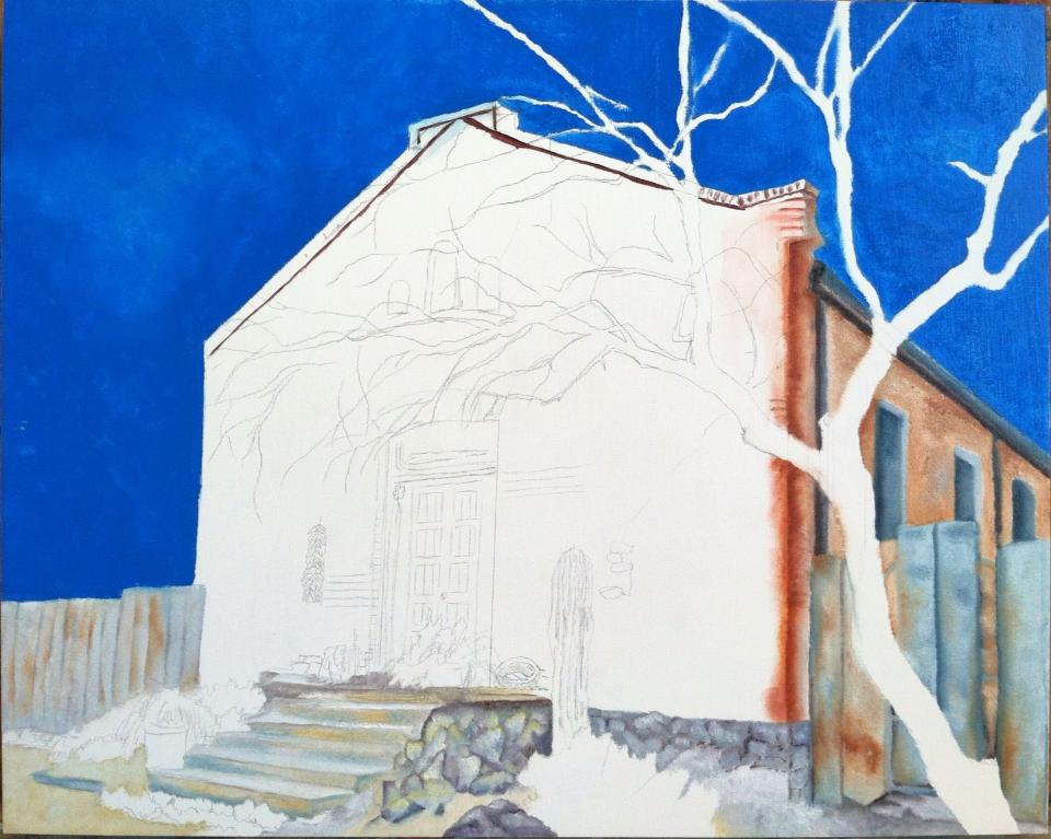 side of building in shade