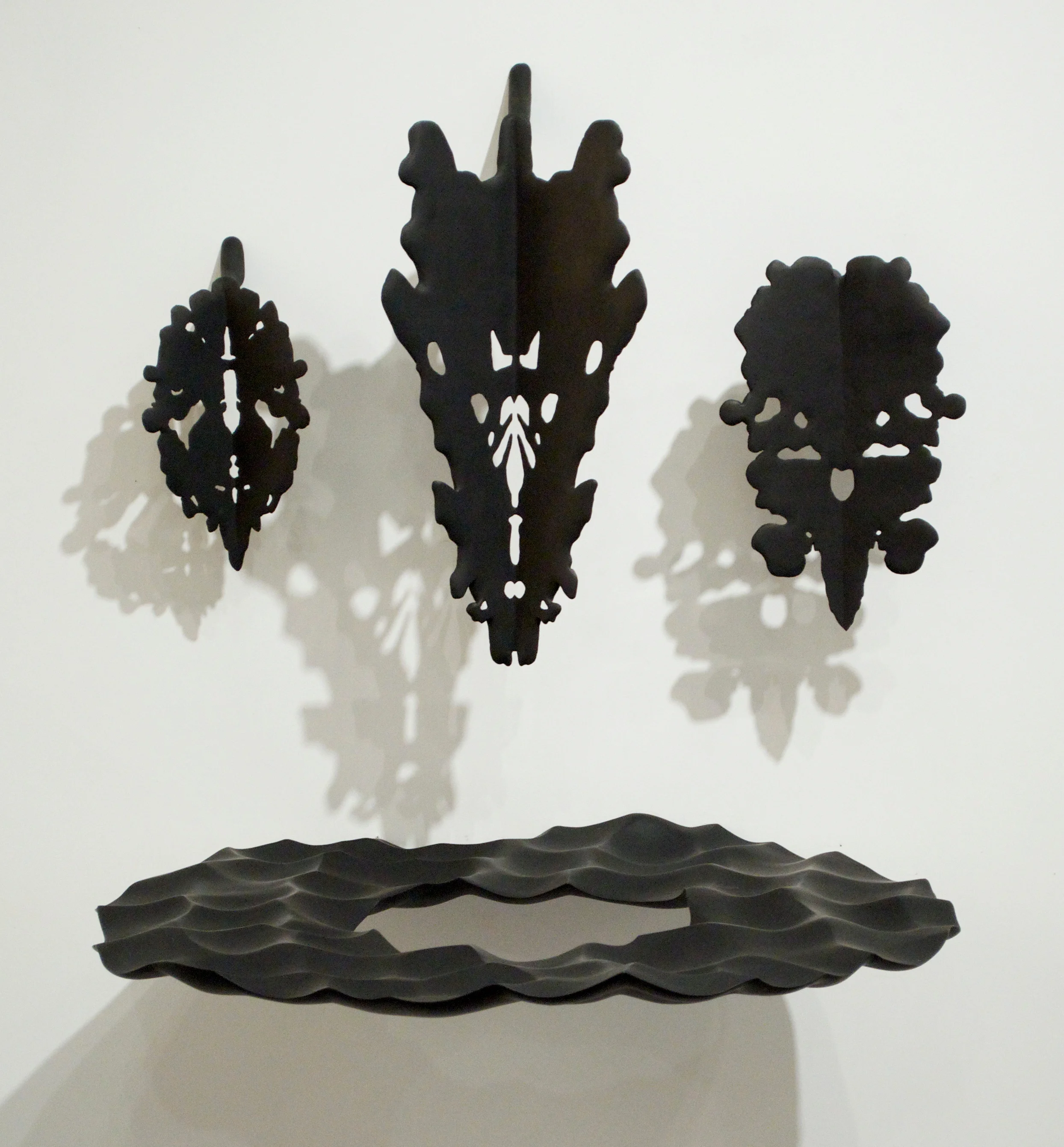River Demons, 24” x 34” x 34”, paint on wood, 2011