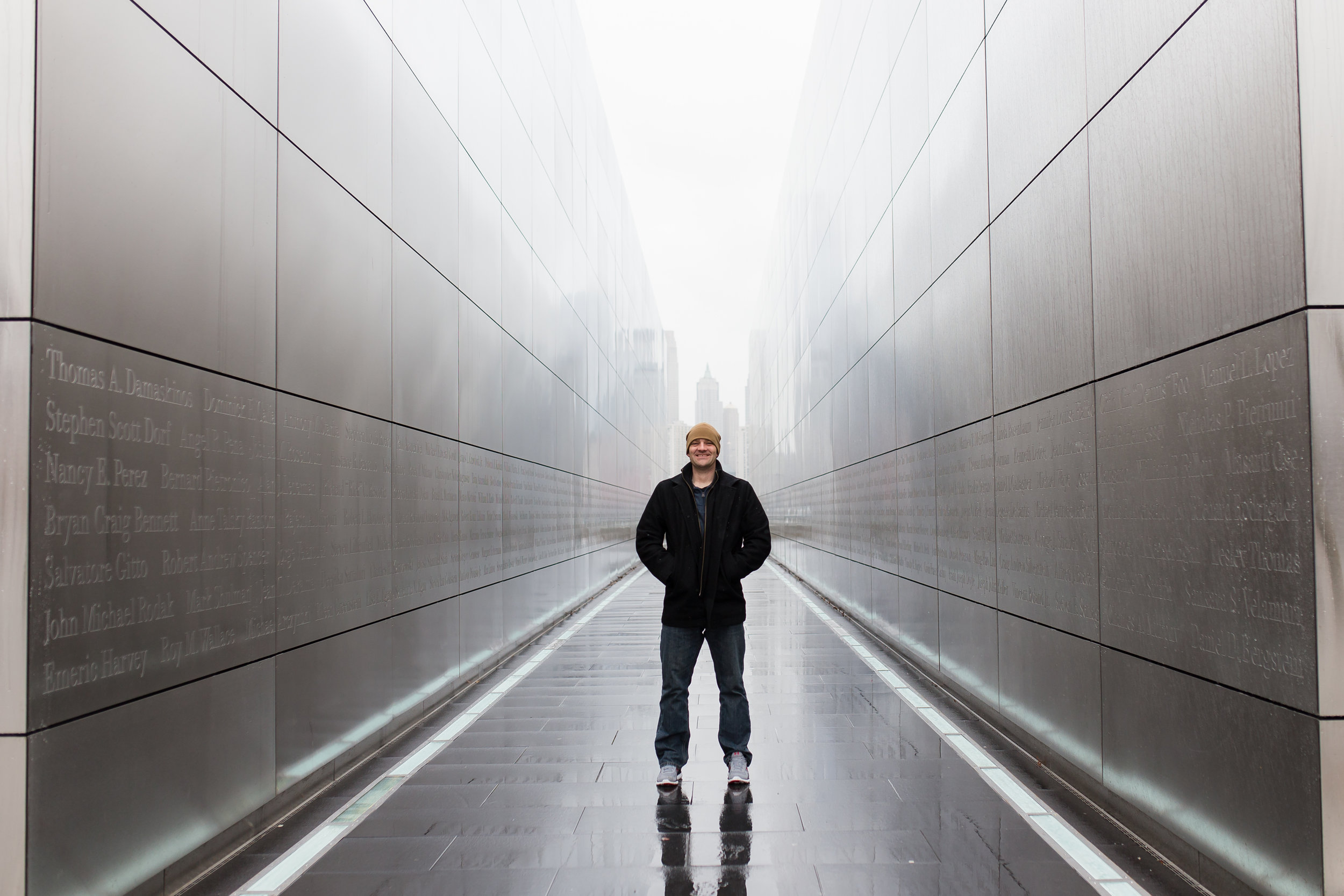 Guy standing at 911 memorial, Liberty State Park NJ 